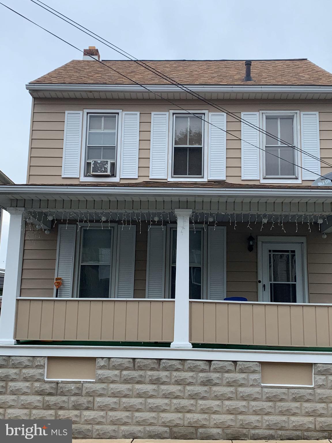 This lovely southside single 3-bedroom with 2 full baths is just adoreable! The home includes a great oversized garage and yard with more off-street parking . First floor laundry and full bath, and a separate dining room off of kitchen and living room. Newer roof on house and garage. Close to stores and hospital.