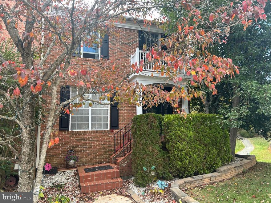 Enjoy three light-filled levels in this well-appointed townhome in Germantown! This gorgeous, updated end-unit home has something for everyone with its bright, inviting interior that has room to relax. You’ll love the open flow of the living and dining space, which features beautiful hardwood flooring that is well-complemented by the large windows and fresh, neutral paint. The living and dining area flows effortlessly into the adjacent kitchen. Sparkling marble counters, white cabinetry, and a suite of stainless steel appliances make this beautiful, modern kitchen a sight to behold. You’ll love relaxing with a cup of coffee in front of the oversized window in the eat-in area. Abundant cabinet and counter space make preparing meals an absolute breeze,  A large pantry offers room for storing all your favorite snacks and ingredients. You’ll love the comfort of many easy configurations on the upper level of this well-appointed home. Three spacious bedrooms await, all with neutral paint and large windows, ideal for relaxing after a long day.  The primary bedroom suite is sure to impress with its oversized walk-in closet with stairs to finished attic and attached private bath with soaking tub and skylight.  The two secondary bedrooms, each comfortably sized and with ample storage space, are serviced by an updated hall bath and laundry closet with stacked washer dryer combo.  In addition, the walk-out lower level is huge, offering an abundance of space to suit whatever your needs may be. Enjoy relaxing in the generously sized rec room which features luxury vinyl plank flooring, gas fireplace, updated full bath, and a convenient kitchen with lots of cabinetry, sink, induction cooktop over oven, and refrigerator, plus a den with attached utility and laundry room provides plenty of storage space.  Walk out to the fenced rear yard with brick patio and stairs to the large deck, and enjoy easy outdoor recreation with the privacy offered by mature trees.   Finally, the home is in move-in condition with new roof with solar panels that  provides tremendous savings on your electric bill, new Anderson windows, new HVAC, new hot water heater, and updated baths.