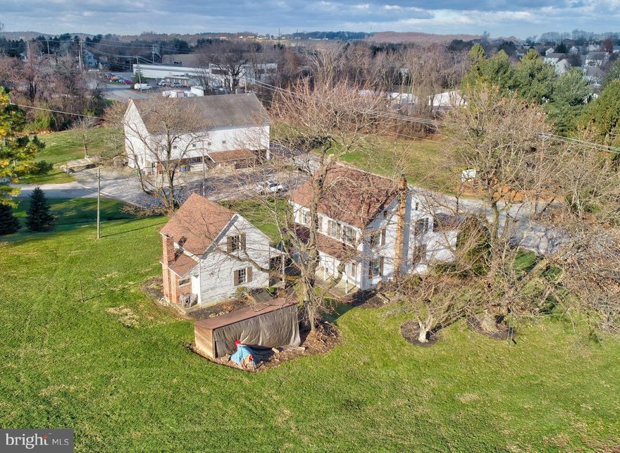 Be sure to consider this 50+ acre parcel that is located just 1 mile off I83 and features Commercial/Industrial Zoning.  The possibilities and options are endless with this parcel.   Here's what makes this parcel something to consider:  while working on approvals etc, you have income producing opportunities by renting out the two homes on site and the barn along with land leasing to the local farmers.