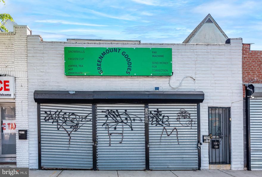 List price is opening bid. Online Auction Only! Bidding begins Saturday, May 16th and ends Thursday, May 21, 2026 at 11:00 AM. Fully tenant-occupied mixed-use property located in the vibrant Waverly neighborhood of Baltimore City. This two-unit building features a ground-level commercial space and a second-floor residential unit, offering immediate cash flow. 

Investment Highlights:
• Current Monthly Income: $2,715
• Annual Gross Income: $32,580
• Two-unit mixed-use: 1 retail + 1 residential
• Separately metered electric

Main Level – Commercial Space ($1,800/month):
Secured under a 5-year lease (Nov 2025 – Oct 2030) with tenant responsible for utilities per lease terms. Features include a storefront with large glass display windows, laminate wood flooring in the lobby, and a flexible layout with retail area, storage room, open workspace, and mudroom. Kitchenette includes sink and refrigerator, plus a half bath.

Lower Level:
Full unfinished basement divided into two open areas, ideal for storage or utility use. Includes sump pump, gas water heater, forced hot air system, and two electrical panels.

Second Floor – Residential Unit ($915/month | Section 8):
Long-term tenant in place. One-bedroom, one-bath unit with private entrance. Carpeted living and bedroom areas, tile kitchen flooring, and forced hot air heat. Tenant pays BGE; landlord covers water.

Exterior Features:
Fenced backyard and A/C condenser unit.

A solid investment opportunity offering dependable rental income with both commercial and residential components in an established Baltimore neighborhood.