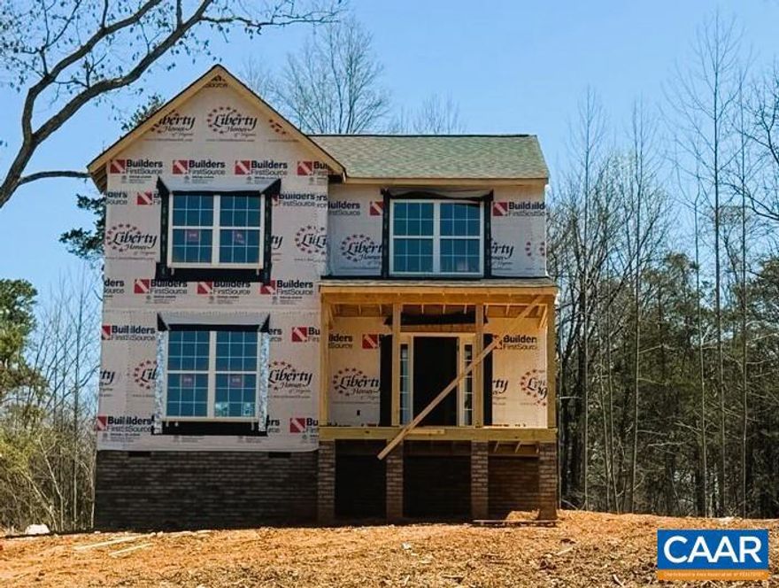 READY FOR DRYWALL NEXT WEEK! (4/8) in Louisa on 1 acre with a welcoming front porch where you can bring your rocking chairs and relax! Interior upgrades include 36" kitchen cabinets with crown molding, French doors leading to the 10x12 rear deck, ceiling fan with light in the primary bedroom, LED lights in the two other bedrooms, adult height toilets in the primary bathroom and half bath and pull down attic stairs with storage trusses. Exterior upgrades include shake and board and bat siding, gable accent and wide window trim instead of shutters, craftsman style front door and vinyl porch rails instead of wood. Call today to ask how you can have up to 2.5% of your closing costs paid as well. No money down loans available. Photos are of a similar completed home.,Formica Counter,Wood Cabinets