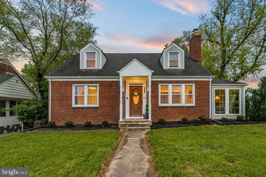 Discover this stylish, sleek, and stunning fully renovated Cape Cod home in the heart of Falls Church. This exceptional single-family home features six legal bedrooms, evenly distributed with two on each level, and three beautifully designed bathrooms. Just minutes from East Falls Church Metro, the Mosaic District, Washington DC, and major routes like Rt. 50 and Rt. 66, the location is as convenient as it is desirable.

The home boasts stunning hardwood flooring throughout and fresh, energy-efficient windows that bathe the space in natural light. The open floor plan seamlessly integrates the living area, featuring a stone surround fireplace, adjacent to the dining area, leading into a fully updated kitchen. The kitchen features gleaming wood cabinets, granite countertops, a stylish backsplash, and Samsung stainless steel appliances. An eat-in bar and an adjoining sunroom with floor-to-ceiling windows and vaulted ceilings make the space ideal for entertaining and relaxing.

On the main level, find two bedrooms accompanied by a full bath, perfect for guests or as a home office. The upstairs hosts two additional bedrooms and a stunning modern fully updated bathroom, while the basement offers two more bedrooms and a full bath, providing ample space for family or visitors. The basement level also features wood-look tile flooring, creating a versatile space for a media room or entertainment area.

Step outside to enjoy the spacious deck and yard, perfect for outdoor gatherings. This home also includes a state-of-the-art HVAC system, and a comprehensive suite of ENERGY STAR certified appliances, ensuring both comfort and efficiency. See for yourself why this home is anything but ordinary.