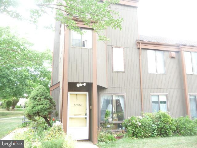 Rarely Offered Bakers Bay 2nd floor condo featuring large living room with wood burning F/P and sliding doors to covered balcony, dining area, eat in kitchen w/gas cooking, Main bedroom with door to balcony, main bedroom bath with stall shower, dressing area and walk in closet, Bedroom 2 with double closet, hall bath and a laundry closet. There is also stairs to a loft area which is an ideal den or office. Condo fees include heated indoor and outdoor pools, hot tub, sauna rooms, tennis courts, fitness center, community building with various other activities. Also included are water, trash pickup, landscaping, snow removal, basic cable and exterior building insurance. Unit needs updating throughout and is being sold "as is"