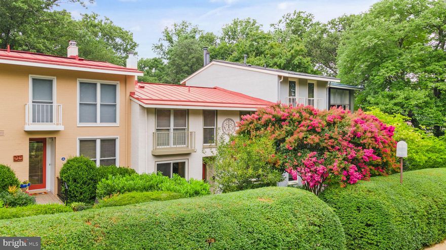 Welcome to 11428 Orchard Lane in the desirable Waterview Cluster neighborhood of Reston! This two-level home surrounded by nature, has over 2000 sq feet of unique living space and offers water views of Lake Anne from the primary bedroom balcony.   The home comes with a covered carport and storage room. There is a community dock, and beach where you can drop in your kayak or paddle board. It’s a short walk to Lake Anne Plaza where you can enjoy many festivals, Reston Community Center, Lake Anne Coffee House & Wine Bar, the Reston Museum, Chesapeake Chocolates, Lake Anne Brew House, New Trail Cycling studio, the Saturday Farmers Market, and so much more!
You are greeted with lush landscaping, a beautiful front paver patio, and a stone walkway.  As you enter the front door, there is a den/office area to your left and an updated kitchen to your right.  The kitchen has been extended and remodeled and offers breakfast seating, a pantry, plenty of cabinetry, shelving, granite countertops, a stainless-steel dishwasher, a gas cooktop with downdraft, and a wall oven.  The rear of the house has walls of glass in the spacious living room and dining room.  The living room has a gas fireplace and recessed lighting and opens to the dining area that has modern cabinetry offering plenty of storage and countertops to make entertaining a breeze. The sliding glass doors walk out to the lovely brick patio, a beautiful outdoor space to relax and enjoy the tranquil setting.  
Upstairs you will find 4 large bedrooms, each with vaulted ceilings, modern ceiling fans, hardwood floors, custom closets, and gorgeous windows!  The primary bedroom has two closets, an ensuite full bathroom, and a sliding glass door to the Juliet balcony. Don’t miss this special home, open house on Sunday, Aug. 6th from 1-3 pm.