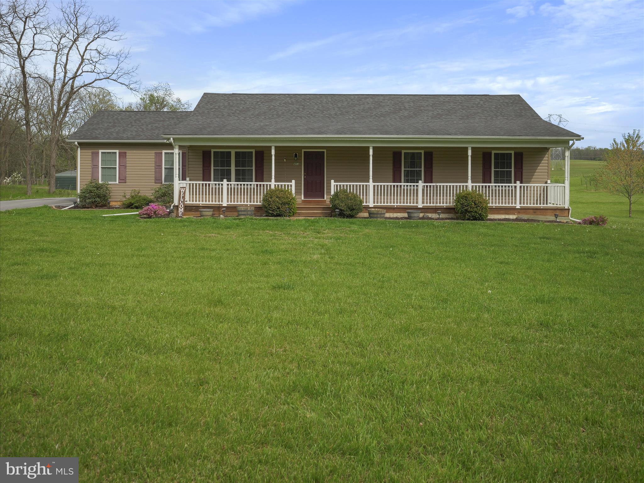 Welcome to your peaceful private One-Owner retreat on 5 Acres, with a Fully Finished Basement and Abundant Wildlife.
Tucked away on a quiet and secluded private lane, this charming one-owner ranch home offers the ideal balance of comfort and nature- all within minutes of Rt. 340 for easy commuting to Virginia or Maryland. Whether you are relaxing on your front porch or or soaking in the scenic views from the expansive back deck, this home delivers the serenity of country living with the convenience of nearby amenities.
Set on 5 level acres, this beautifully maintained home features 3 bedrooms and 3 full bathrooms, including a fully finished basement that adds incredible flexibility. The main level boasts an open-concept layout with a country kitchen (all appliances included), a bright dining room and a large living room. A sliding glass door leads to a deck that spans nearly the entire house, perfect for entertaining or enjoying peaceful mornings as you watch wildlife like deer and turkeys pass by.
The finished basement includes a spacious rec room, large office, potential fourth bedroom/den, full bath and laundry room with plenty of extra storage. There is outside access door and stairs for an additional safe exit. There are many options a guest suite, home gym or multi-generational living.
A two car garage and 2-car detached carport, new water heater and new flooring in the kitchen and living room. Abundant natural beauty and privacy.
Step outside and enjoy your own personal orchard, featuring producing fruit trees including 5 peach,4 apple , 2 pear and a cherry. There's plenty of space for a garden or additional landscaping to make it your own.
Whether you're seeking a forever home or a secluded getaway with modern conveniences nearby, this rare property is a must see. Schedule your showing today-your peaceful retreat awaits you.