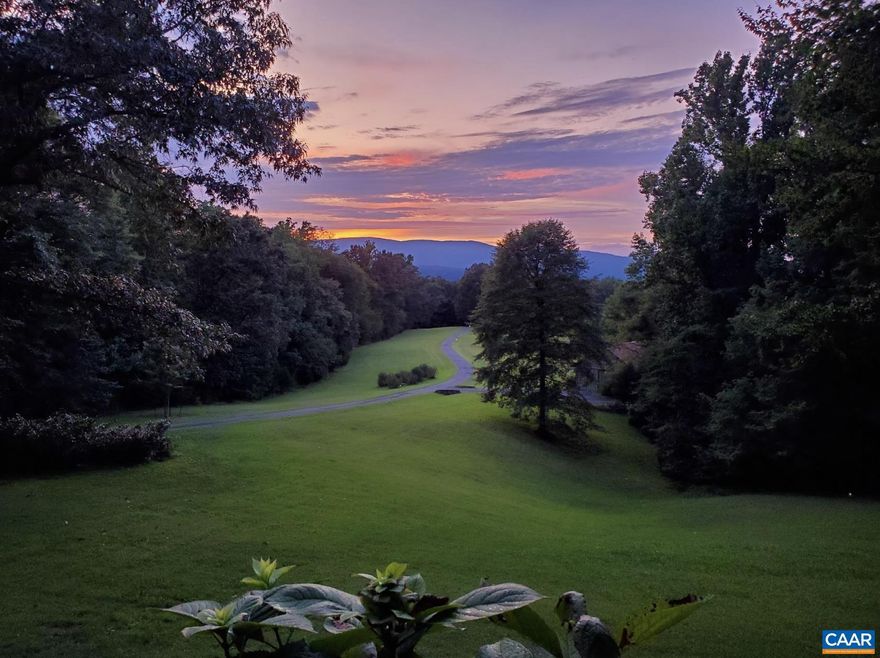 A striking contemporary home, this rare gem was designed by renowned UVA architectural professor Jim Tuley and is perfectly situated on 30+ private acres with sweeping Blue Ridge Mountain views. Walls of glass fill the interior with natural light and frame the stunning landscape. The house features a remodeled kitchen, newly updated bathrooms, a spacious screened-in porch and deck, and primary suite complete with a soaking tub overlooking the mountains. The exceptional property boasts beautiful gardens, mature plantings, fruit trees, a koi pond, impressive stonescape, and a versatile barn/art studio ideal for creative or functional use. For animal lovers, a large rolling meadow is perfect for horses, and the woods offer walking trails. With solar power and a newer whole-house generator, this private retreat combines architectural sophistication, sustainability, and natural beauty?just minutes from Crozet and Charlottesville.,Soapstone Counter,Wood Cabinets,Fireplace in Home Office,Fireplace in Living Room