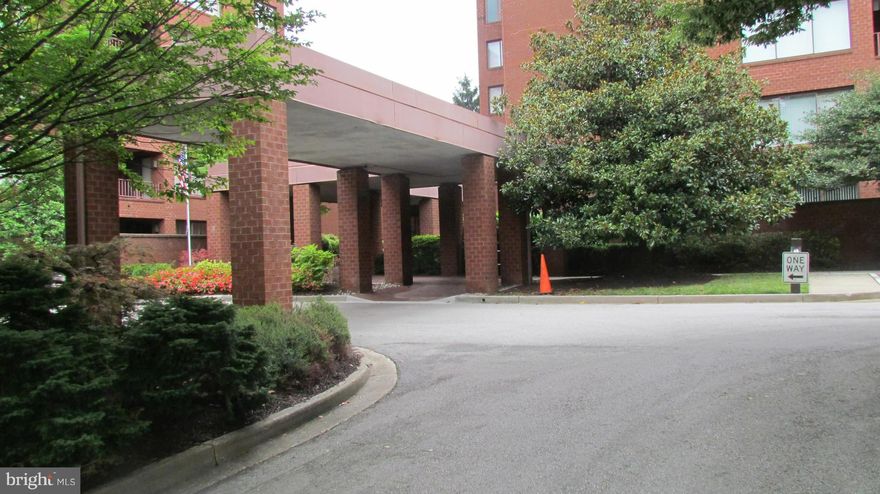 2 bedrooms w/den and small office.  2 - full 1-   1/2 bath. Eat in kitchen. Nearly new wood floors / carpet throughout. Huge living room and dining room w/slider to balcony.  Custom built-ins, newer full sized washer/dryer, ample closet space. Monthly Condo fee includes cable, water, community clubhouse, tennis, outdoor pool. 2 deeded parking spots in secure garage. Gated community.