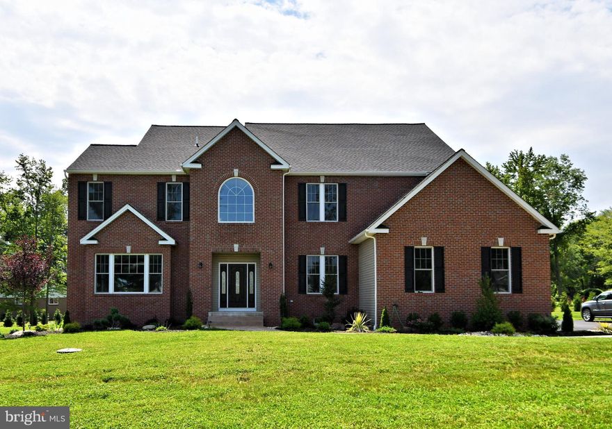 Seller financing with 20% down payment!!!  Beautiful New Construction Custom Home!!! Move right-in this marvelous center hall colonial with over 5500 sq ft. plus over 2000 sq ft in outstanding basement.  Entering the double doors you will discover marvelous hardwood floors that run through the entire first floor. The oversized two story foyer features 10" ceilings on the 1st floor with wainscoting. Double doors into the spacious living room/play room/study with wainscoting and recessed lighting. The elegant open floor plan runs from the gourmet kitchen with quartz counter tops.  The island with waterfall quartz. Recessed lighting everywhere and a walk-in pantry. The kitchen flows to the fantastic family room, which features a gas fireplace and tons of recessed lighting. Down the hall is a in-law/au pair suite/study with a stylish bathroom. Upstairs you have 5 additional bedrooms. The main suite with double doors for privacy and a lavish en suite. The spectacular marble bathroom features a soaking tub , double vanity, and a frameless shower. This primary bedroom also has an enormous walk-in closet. There is a princess suite , 3  other bedrooms, a hall bathroom, and laundry room. The  sweeping basement is completed with tile flooring, a full bathroom, and several rooms. This home sits on over 1.2 acres. It's a must see for the money!!!