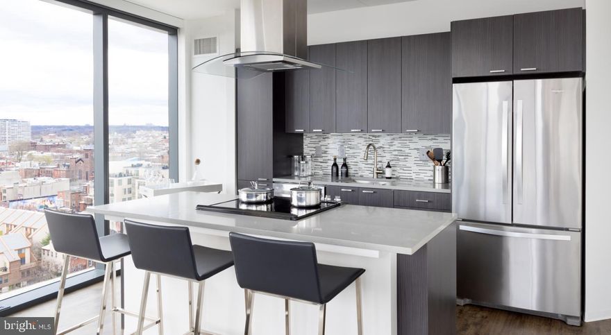 Welcome to NorthXNorthwest, a premier residential destination in Philadelphia’s iconic Art Museum neighborhood where refined living meets modern design, all set against the backdrop of some of the city’s most treasured cultural institutions. Designed for those who seek a vibrant city lifestyle without compromising comfort, elegance, or convenience, NorthXNorthwest elevates apartment living into a curated experience. 

 

The architecture of NorthXNorthwest is a striking blend of contemporary form and urban sophistication, with expansive glass facades and sleek lines that mirror the dynamic spirit of the neighborhood. From the moment you step into the grand lobby, you’re met with a sense of calm and style—soaring ceilings, sophisticated finishes, and thoughtfully designed spaces that instantly signal this is more than just an apartment community—it’s a lifestyle. 

 

Each apartment at NorthXNorthwest is crafted with meticulous attention to detail, offering open-concept layouts that maximize natural light and provide seamless flow from living areas to private retreats. Floor-to-ceiling windows frame sweeping views of the city skyline, Fairmount Park, and the Schuylkill River, while wide-plank flooring, quartz countertops, and premium stainless steel appliances speak to a higher standard of urban living. Spacious kitchens feature modern cabinetry and generous counterspace, perfect for quiet meals at home or entertaining guests. Bedrooms offer a serene escape, with plush carpeting and oversized closets, and spa-inspired bathrooms provide the perfect blend of luxury and function. 

 

But what truly distinguishes NorthXNorthwest is the amenity experience, designed with an elevated urban lifestyle in mind. At the heart of the community is a resort-style rooftop terrace complete with panoramic city views, plush lounge seating, fire pits, and grilling stations—ideal for sunset cocktails or weekend gatherings. The resident lounge is styled like a boutique hotel, offering intimate seating areas, curated art, and ample space to relax, work remotely, or meet with friends. A state-of-the-art fitness center offers top-tier cardio and strength training equipment, along with dedicated spaces for yoga and functional movement training. 

 

For residents who work from home or require flexible workspace, NorthXNorthwest offers beautifully designed co-working lounges with high-speed internet and quiet breakout zones—where productivity meets comfort. A private screening room, on-site café, and indoor-outdoor social spaces provide thoughtful extensions of your home, with design details that reflect the building’s contemporary aesthetic. 

 

Living at NorthXNorthwest also means immersing yourself in one of Philadelphia’s most inspiring and walkable neighborhoods. Step outside and find yourself just moments from the Philadelphia Museum of Art, The Barnes Foundation, Boathouse Row, and miles of trails along the Schuylkill River. The culinary scene surrounding the building offers everything from craft coffee shops and gourmet markets to acclaimed restaurants and hidden neighborhood gems. The streets pulse with energy—lined with tree-shaded sidewalks, historic architecture, and a rich tapestry of culture and creativity. 

 

Future residents will love not just the space they live in, but the life they live here. NorthXNorthwest offers the rare combination of upscale design, thoughtful amenities, and a location steeped in art and culture—all brought together in one of Philadelphia’s most sought-after addresses. It’s more than just an apartment—it’s a place to truly call home. 

 

** Pricing and availability subject to change on a daily basis ** Photos are of model units ** Parking may be available for an additional fee, subject to availability **