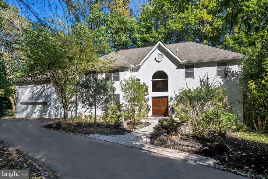 In-person showings available! One-on-one in-person showings are now allowed. Please contact the listing agent to schedule. Virtual tours are also available. An elegant upscale family home awaits at the end of a long drive, in a quiet cul-de-sac setting and premier neighborhood. A home of this quality is rarely available at this price. Situated at the crossroads of coveted Penn Valley and Bala Cynwyd, this pristine 5 bedroom, 5.3 bath jewel is a custom dream for your family, built with quality and attention to detail top of mind. Enjoy privacy and natural beauty surrounded by .77 acres of lush landscaped grounds, not to mention the finely-designed interiors spanning 6,465 sq ft. Double front doors reveal an airy 2-story hardwood foyer brightened by Palladian windows, with a dramatic marble staircase ascending to an open upper landing. Entertain comfortably in the light-filled living room, where the hardwood floors continue to enrich the ambience. Connected is the formal wainscoted dining room, affording a seamless flow for hosting guests. The sunny sky-lit kitchen sits right nearby for easy serving, offering abundant cabinetry, granite countertops, a large center island with cooktop & seating for 4, brand-new stainless-steel appliances, 2 pantries & a casual dining area where the family will love to gather. Glass sliding doors open out to the peaceful oversized deck for dining al fresco & taking in scenic views. A bar/serving area with cabinetry & sink adjoins the spectacular double-height family room with expansive walls for showcasing art, met by a striking wood-burning fireplace with a stone & mosaic detailed mantle rising 30 ft to the ceiling. This is flanked by picture windows & glass doors leading out to the deck. Also, on the main level is an office/library, 2 powder rooms, a mudroom/laundry room & attached 3-car garage. The upper level presents generous sleeping quarters, the highlight of which is the fabulous master bedroom retreat. The vaulted bedroom is simply divine, enhanced by a sky-lit sitting room and tremendous fitted closet space including 2 walk-ins. The real showstopper is the enormous master spa bath with a vaulted ceiling, his & her vanities, a center Jacuzzi soaking tub and separate shower. Three additional bedrooms are en-suite with private baths and spacious closets. Extensive living/entertaining space continues on the lower level with a 2nd family room providing walkout access to a large patio via glass doors. There is also a private bedroom with en-suite bath & patio doors, den/exercise room, and powder room. This Penn Valley location, in the top-rated Lower Merion School District this home offers access to the coveted Belmont Hills Elementary, Welsh Valley Middle School, and Harriton High School.  Close to all conveniences, including major routes for a quick commute to Center City this home truly has it all!