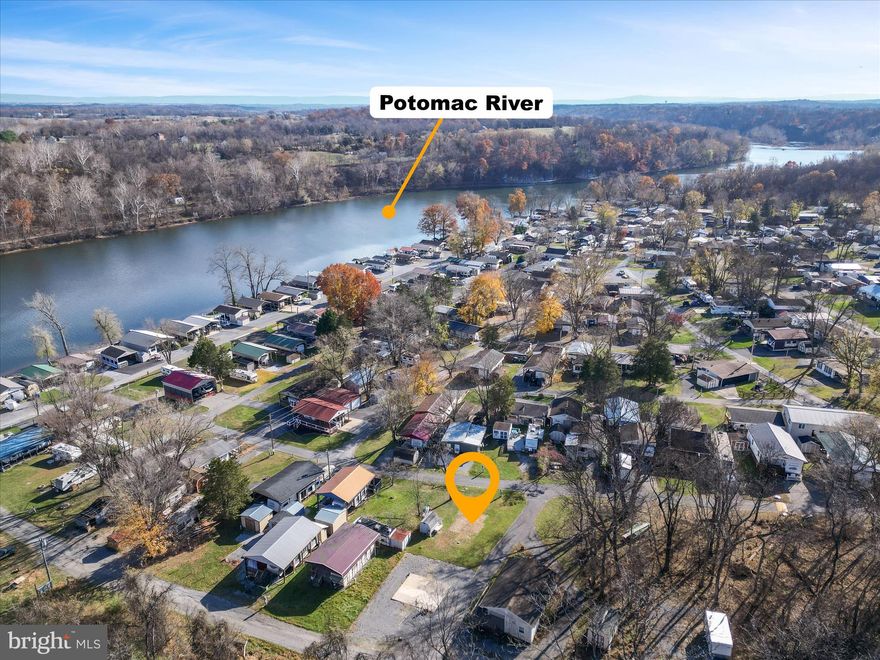 Looking for an RV lot just a block from the beautiful Potomac River? This manicured, level lot is ready for your arrival, offering full hook-ups—including water, sewer, a 50-amp receptacle—and a convenient storage shed. With generous road frontage, there’s ample room for guests, vehicles, or all your favorite water toys.
As part of the community, you’ll enjoy an array of amenities such as swimming pools, tennis courts, playgrounds, miniature golf, and a welcoming clubhouse—all covered by the HOA fee. The community’s spectacular Fourth of July fireworks show is a local highlight you won’t want to miss.
Just steps from the river, you can spend your days swimming, boating, or fishing. Members also benefit from discounted guest passes and have the option to join the boat club for easy boating access.
Whether you're seeking a peaceful weekend getaway or a seasonal home base, this lot offers freedom, recreation, and an unbeatable location. Seller has paid 2026 Membership dues.