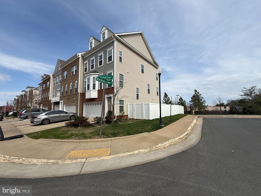 Built in 2019, this spacious end-unit townhome offers bright, sun-filled living spaces designed for comfort and style — and is listed at an attractive price to make it your own. The main level features beautiful luxury vinyl plank flooring and a gourmet kitchen complete with granite countertops, gas cooking, abundant cabinet space, and a large center island perfect for entertaining. Step outside to the composite deck, ideal for relaxing or hosting guests while extending your living space outdoors.

Upstairs, the primary suite serves as a true retreat, featuring a custom walk-in closet to keep everything organized and a luxurious soaking tub perfect for unwinding after a long day. Two additional bedrooms, a full hall bath, and a convenient upper-level laundry area complete the second floor.

The finished walk-out basement opens to a fully fenced backyard your pets will love. With natural light streaming through the sliding glass doors, the lower level feels warm, inviting, and full of possibilities for additional living or entertainment space.

Conveniently located with easy access to I-66 and Prince William Parkway, commuting is simple, while nearby restaurants, breweries, and charming Old Town offer plenty of options for dining, shopping, and entertainment.