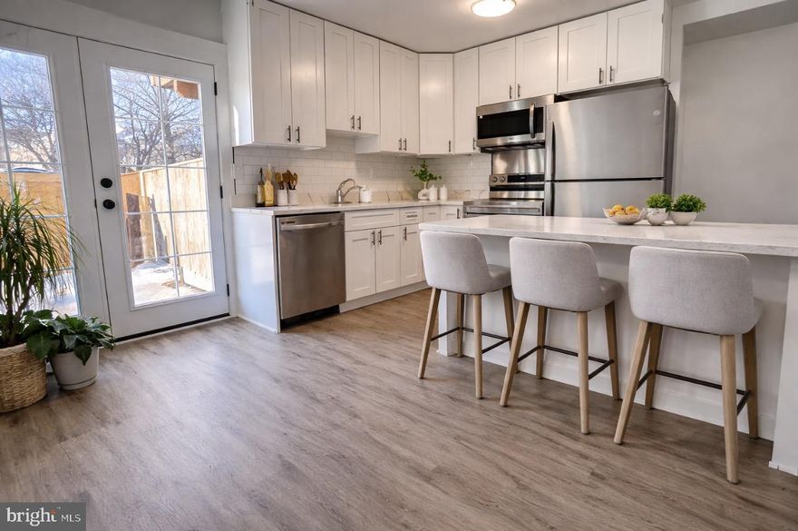 Welcome to your dream home! This beautifully updated two-bedroom condo is truly move-in ready, offering thoughtful upgrades and comfortable living throughout. Brand-new vinyl plank flooring, fresh paint, and a partially renovated bathroom give the home a modern, refreshed feel.

Step inside to a bright and airy living space featuring stylish new flooring and a cozy sunken living room filled with natural light. The kitchen shines with updated appliances, ample room for a dining table or future island, and a spacious walk-in pantry for abundant storage. A door off the kitchen leads to your private, hardscaped patio — perfect for entertaining, grilling, or simply relaxing. The fully fenced yard provides added privacy and security.

Both bedrooms are generously sized, and additional upgrades include all-new windows and a few years old water heater. Outside, you’ll appreciate the built-in shed for extra storage, along with neighborhood tot lots and common areas.

Located in the heart of Crofton, you’ll have the option to join the Crofton Village Pool within walking distance, plus enjoy easy access to shops, restaurants, schools, and major commuter routes to DC, Fort Meade, and the Naval Academy. Zoned for sought-after Crofton schools — this is one you won’t want to miss!