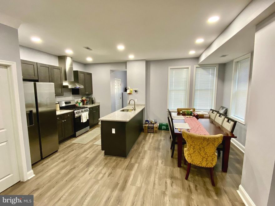 Welcome to 746 Linnard St, an impeccably updated end-unit brick townhouse that radiates modern elegance and classic charm. This home is a true gem, offering a fantastic opportunity for anyone seeking the perfect blend of style, comfort, and convenience. Step inside and be instantly captivated by the engineered floors and recessed lights in the bright and spacious living room, setting the tone for the entire home. The open concept design seamlessly flows into the dining area and leads to the chef's kitchen, which features brand-new stainless-steel appliances and ample counter space, making it a culinary enthusiast’s dream. Including granite countertops and trendy dark wood cabinetry. Convenience is key with the main level laundry room just off the kitchen, providing easy access to the rear parking pad. The lower level is a versatile space for a family room, home office, or gym. It also includes a convenient full bath. Upstairs, the primary bedroom offers a luxurious retreat with an ensuite bathroom. Additionally, there are two more bedrooms and a full bathroom, ensuring plenty of space for family and guests. Enjoy your mornings or evenings on the spacious front porch, ideal for sipping coffee or greeting neighbors. A home where every detail has been thoughtfully designed to provide an exceptional living experience. New HVAC system, hot water heater, and windows. Don’t miss out on this incredible opportunity—schedule your tour today.