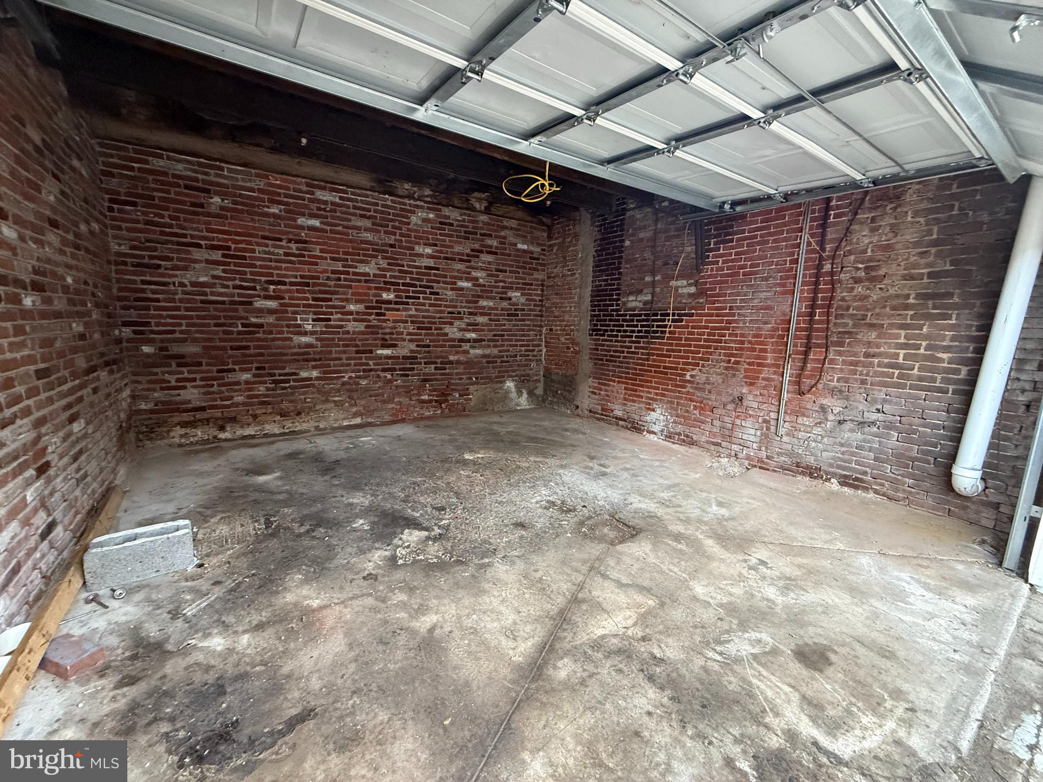 Garage for rent for car parking / storage or personal / material storage. There is no power or water. This CAN NOT BE USED AS A DETAIL OR AUTO REPAIR SHOP. The garage door is 12'8" wide by 6'7" high. The interior is 15' 6" wide by 15'6" deep by 8'9" tall. 12 to 24 month lease accepted. First, last and security deposit needed.