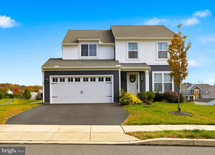 Welcome to 19 Heatherwood Lane, a beautifully maintained 5-year-old home located in the desirable Heatherwoods neighborhood. Offering 2,068 sq. ft. of finished living space above grade plus an additional 812 sq. ft. finished in the walk-out lower level, this home provides exceptional living space both inside and out. The main level features luxury vinyl plank flooring throughout and an open-concept layout ideal for everyday living and entertaining. The stunning kitchen includes a large center island, granite countertops, and ample cabinetry. A bright breakfast nook fills the space with natural light and provides lovely views—plus it opens directly to a covered porch/deck, perfect for outdoor dining or relaxing.
Upstairs, you’ll find four spacious bedrooms, including a primary suite with a private bath and walk-in closet. A convenient second-floor laundry room and a full hall bath complete the upper level.
The finished walk-out lower level offers fantastic extra living space—whether for a family room, home office, gym, or recreation area—and includes a bath rough-in, allowing easy addition of a future bathroom if desired.
Located in a peaceful neighborhood setting with easy access to local conveniences, highways, and schools, this home is ready to welcome its next owners.
Don't miss your chance to make this move-in-ready property yours!