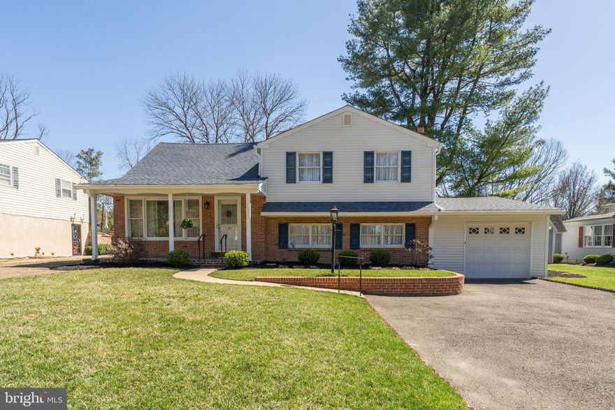 Welcome home to 312 E Mill Rd. which is located in the highly sought after Springfield School District. 
This well maintained four bedroom, two and a half bath split-level home sits on over a half-acre of land. The main level has a living room, dining room and an enormous kitchen that's only a few years old with granite counters and updated appliances that overlooks the huge back yard. The second floor has three good-sized bedrooms and an updated bathroom. The primary bedroom with private bath is located on the third floor and also offers an amazing view of the backyard. The lower-level family room has a wood burning fireplace, built in shelving and plenty of space for entertaining. A separate laundry room and powder room complete the lower level. Speaking of entertaining, you can exit the kitchen to a new Trex deck and relax while enjoying the view. Attached one car garage can be entered off the laundry room. This home has an underground sprinkler system in the front, side and rear of the home. The roof is four years old and the siding and gutters a just a few years old. This home is a must see!