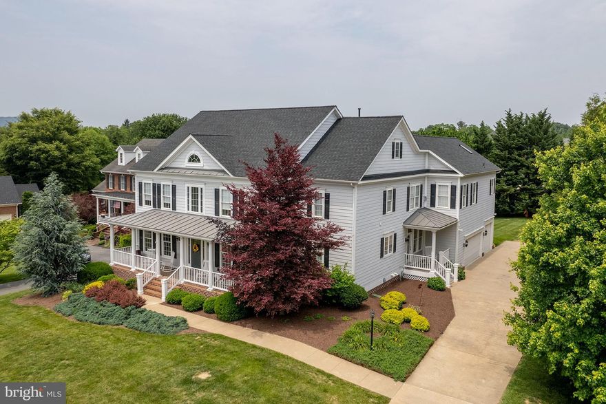 One-owner, custom home, thoughtfully built with added upgrades by the builder! Buy your new home and enjoy a 1% lower interest rate for the first year with a temporary buydown incentive - helping make your first year of homeownership more affordable! Ask for details!

Approximately 6,500 finished square feet of living space! A place to grow, gather, and stay awhile! From the moment you arrive, this property greets you with thoughtful details and a sense of home you can feel.  A brick-paved, rocking chair-worthy, front porch sets the tone, and the charming side porch with composite decking is both stylish and maintenance-free. This spacious 6+ bedroom/5.5 bath residence features a main-level bedroom and full bath—ideal for an in-law suite. Just off the kitchen, the covered back deck offers the perfect space for entertaining. Inside, you’ll find a kitchen that doesn’t compromise with Jenn-Air appliances, solid cherry cabinetry, and an oversized walk-in pantry, making cooking a joy. Hardwood and tile floors flow throughout the main level, while the lower-level recreation room boasts durable waterproof laminate flooring. The expansive primary suite offers a double-sided gas fireplace and a private wet bar/coffee bar with a sink—ideal for unwinding after a long day. The bedroom-level laundry room is fully equipped with cabinetry and a utility sink for added convenience. A 3-car side entry garage includes a half bath. Modern comforts include multiple furnaces & heat pumps,  central vacuum & intercom system, front yard irrigation, an intercom system, and no costly monthly HOA dues. Whether you are seeking multi-generational living or space for a large family, this home blends thoughtful design with timeless upgrades. Recent updates include a new roof (2023), attic HVAC serviced/replaced A coil (2024), basement HVAC replaced A Coil & condenser (2021), and a new water softener (2025). See the virtual tour attached to the listing!