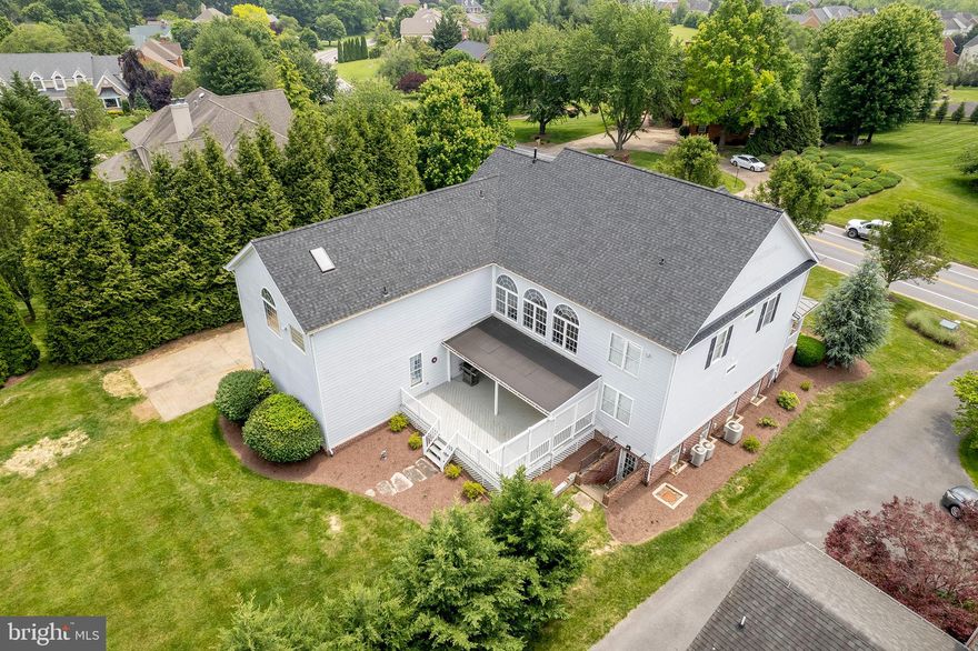 Buy your new home and enjoy a 1% lower interest rate for the first year with a temporary buydown incentive - helping make your first year of homeownership more affordable! Ask for details!
Recent Updates include a new roof (2023), attic HVAC serviced/replaced A coil (2024), basement HVAC replaced A Coil & condenser  (2021), and a new water softener to be  installed (2025) One-owner, custom home, thoughtfully built with added upgrades by the builder!
 Approximately 6,000 finished square feet of living space! A place to grow, gather, and stay awhile! From the moment you arrive, this property greets you with thoughtful details and a sense of home you can feel.  A brick-paved, rocking chair-worthy front porch sets the tone, and the charming side porch with composite decking is both stylish and maintenance-free. This spacious 6+ bedroom/5.5 bath residence features a main-level bedroom and full bath—ideal for an in-law suite. Just off the kitchen, the covered back deck offers the perfect space for entertaining. Inside, you’ll find a kitchen that doesn’t compromise with Jenn-Air appliances, solid cherry cabinetry, and an oversized walk-in pantry making cooking a joy. Hardwood and tile floors flow throughout the main level, while the lower-level recreation room boasts durable waterproof laminate flooring. The expansive primary suite offers a double-sided gas fireplace and a private wet bar/coffee bar with a sink—ideal for unwinding after a long day. The bedroom-level laundry room is fully equipped with cabinetry and a utility sink for added convenience. A 3-car side entry garage includes a half bath. Modern comforts include multiple furnaces & heat pumps,  central vacuum & intercom system, front yard irrigation, an intercom system, and no costly monthly HOA dues. Whether you are seeking multi-generational living or space for a large family, this home blends thoughtful design with timeless upgrades. See the virtual tour attached to the listing!