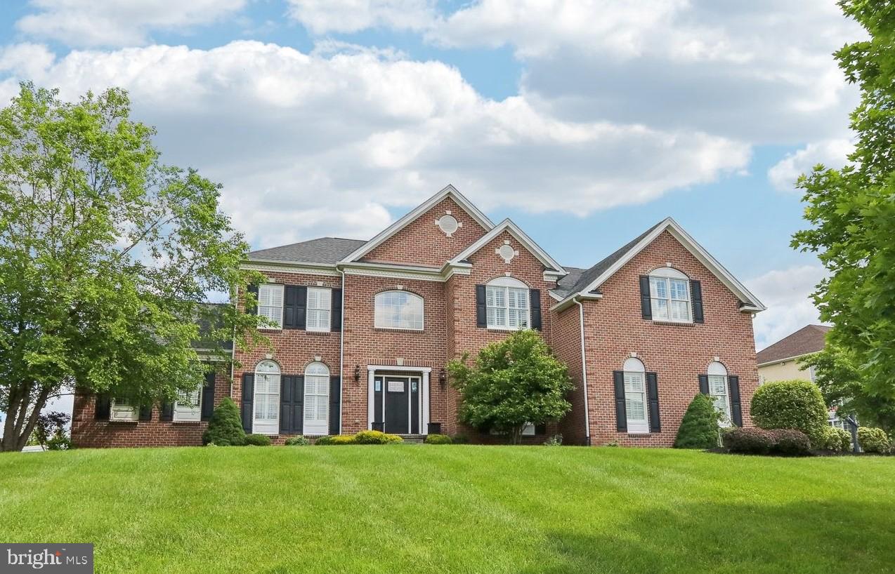 Welcome to luxury living in the esteemed community of Chapman’s Corner, where sophistication meets comfort in this exquisite 4-bedroom residence. As you enter this meticulously crafted home, you'll find hardwood floors, soaring 10’ ceilings, and a stunning turned staircase that serves as a focal point of the grand foyer. Entertain with ease in the open-concept living and dining room, adorned with crown molding and wainscoting, perfect for entertaining. Retreat to the private main level study for moments of quiet reflection, or unwind in the sunroom, bathed in natural light from walls of windows that offer picturesque views of the serene surroundings. The heart of this home lies within the gourmet kitchen, boasting an oversized island, granite countertops, and high-end stainless-steel appliances, including double wall ovens. Adjacent, the breakfast room welcomes you with a skylight and a door leading to the outdoor oasis—a seamless transition from indoor to outdoor living. Relax in the Family Room, where a stone floor-to-ceiling fireplace serves as a striking focal point against two-story ceilings. An additional staircase leads to the upper floor, where four spacious bedrooms await. Two bedrooms boast ensuite baths, while the remaining two share a Jack & Jill style bathroom. Retreat to the luxurious Primary Suite, a sanctuary of comfort and style. Enjoy a private sitting area, custom walk-in closets, and a spa-like main bathroom complete with an oversized walk-in shower and separate soaking tub. Outside, enjoy your private outdoor haven, complete with a fenced yard, sparkling in-ground pool with spa, and multi-tiered paver patio—an entertainer’s dream. The pool house adds convenience and charm with a half bath, kitchenette, and ample storage space. The current owners have prepaid for a year of pool maintenance. With an oversized 3-car garage, shopping, dining, and commuter routes just minutes away, this home offers the perfect blend of luxury, convenience, and tranquility. Nestled within the award-winning Council Rock School District, embrace the epitome of upscale living in this Chapman’s Corner masterpiece.