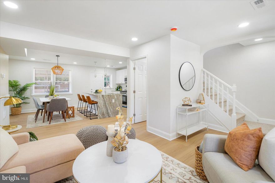 BACK ON MARKET!! Nestled in the charming Edmondson Village, this delightful 3-bedroom, 2.5-bathroom townhouse exudes warmth and comfort. Built in 1951, this traditional brick home has been thoughtfully updated while retaining its classic appeal. With 1,200 square feet of fully finished living space, it's perfect for creating lasting memories. Step into the heart of the home, where the kitchen shines with modern stainless steel appliances, including a built-in microwave, dishwasher, and a gas oven/range. Whether you're preparing a cozy dinner or entertaining friends, this kitchen is designed for both functionality and style. The spacious layout flows seamlessly into the inviting living areas, adorned with a mix of plush carpet and luxury vinyl plank flooring, ensuring comfort underfoot. The fully finished basement offers additional space for relaxation or play, making it a versatile area for your needs. Enjoy the convenience of on-street parking, and take advantage of the vibrant community surrounding you. This home is not just a place to live; it's a sanctuary where you can unwind and enjoy life's simple pleasures. With its blend of classic charm and modern amenities, this townhouse is ready to welcome you home. Don't miss the opportunity to make it yours!