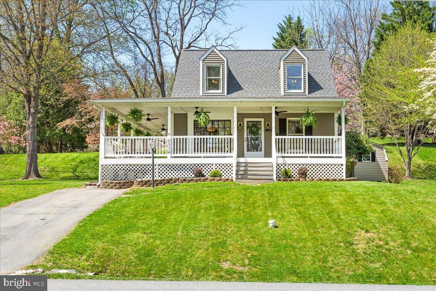 Welcome to your storybook escape in the highly coveted Lake Linganore community of Pinehurst. Nestled among serene natural beauty, this charming Cape Cod offers the rare blend of timeless character and modern luxury. Thoughtfully renovated in 2016, this residence masterfully balances elegant updates with original charm—creating a home that is both refined and inviting. From the moment you arrive, you’re greeted by an expansive, inviting front porch—your personal front-row seat to tranquil sunrises framed by the wooded lot just across the way. Step inside to discover rich hardwood flooring flowing throughout the main level, setting the stage for an airy, open-concept layout designed for both everyday living and elegant entertaining. The sun-drenched kitchen is a showstopper, featuring a wrap around counter with bar seating, stainless steel appliances, and modern floating shelves—paired beautifully with generous table space and oversized windows that bathe the space in natural light. Just around the corner, a stylish living room with recessed lighting and a convenient half bath completes the main level. Upstairs, two spacious bedrooms share a sophisticated full bath, complete with a dual vanity and a tub/shower combo—perfectly blending comfort and functionality. The partially finished lower level offers additional flexible living space—ideal for a cozy media room, fitness area, or home office—along with a designated laundry room. Notable updates include a new HVAC system (2019) and a brand new roof (2023), ensuring peace of mind for years to come. Enjoy exclusive access to all that Lake Linganore has to offer—pristine lake and beach areas, resort-style pools, scenic walking and biking trails, playgrounds, and a vibrant community atmosphere. All just minutes from major commuter routes like I-70, I-270, and Route 15. Don’t miss your chance to experience elevated living in one of Frederick County’s most desirable communities. Welcome home.