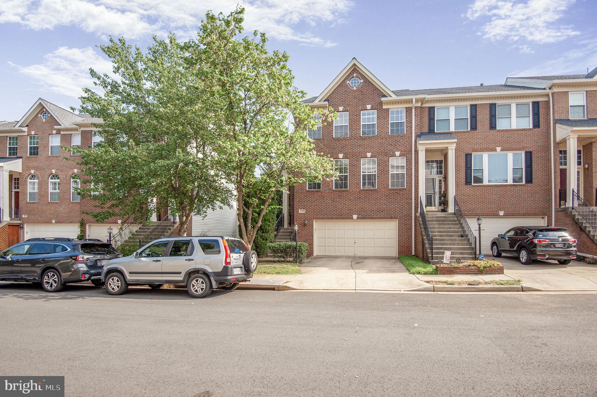 Welcome to this beautifully maintained 3-bedroom, 3.5-bath end-unit townhouse located in the desirable Potomac Lakes community of Sterling, VA. This bright and spacious home spans three fully finished levels and is packed with standout features—including a new roof and fresh paint in 2024, a new HVAC system installed in 2021, and a custom-built walk-in closet in the primary suite.
From the moment you arrive, you'll notice the enhanced curb appeal provided by mature trees surrounding the home, offering rare natural privacy. Inside, large bay windows on all three levels flood the home with natural light and enhance the open, airy feel throughout.
The main level boasts an open-concept living and dining area with gleaming hardwood floors, perfect for entertaining or relaxing. A dedicated study room/home office offers a quiet, flexible space for remote work or study. The updated kitchen features stainless steel appliances, ample cabinet space, and opens to a stunning two-level deck complete with built-in seating benches—ideal for outdoor dining, lounging, or hosting guests.
Upstairs, the primary suite serves as a tranquil retreat with vaulted ceilings, a custom walk-in closet, and a spacious en-suite bathroom. Two additional bedrooms, a full hall bath, and convenient upstairs laundry complete the upper level.
The fully finished walk-out basement offers a large rec room, an additional full bathroom, and direct access to the backyard—perfect for pets, play, or gardening.
Located in the vibrant Potomac Lakes community, residents enjoy fantastic amenities including pools, tennis courts, playgrounds, walking trails, and more. With easy access to major commuter routes, shopping, dining, and entertainment, this home offers the perfect combination of comfort, convenience, and lifestyle.