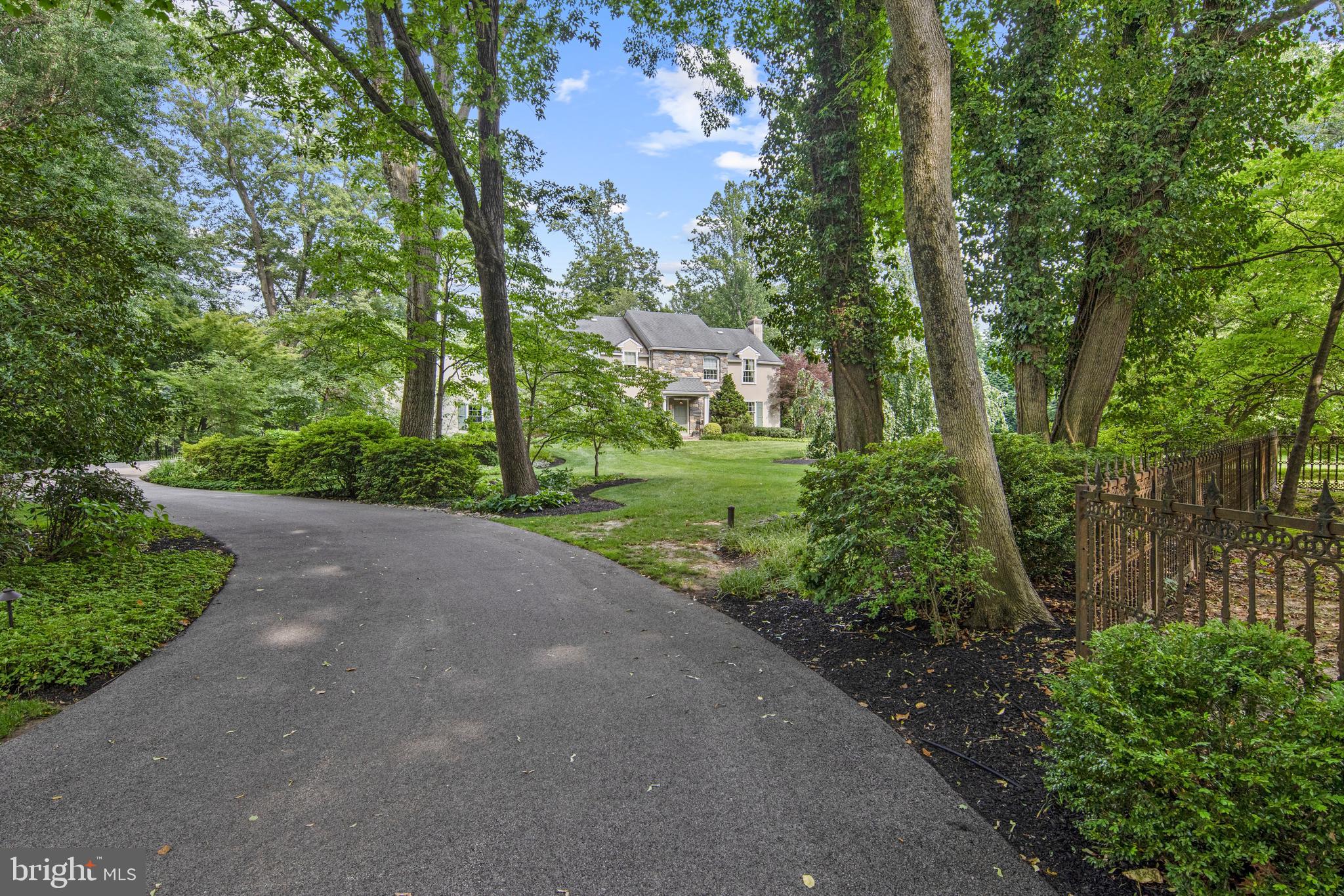 Welcome to 8 Shannon Circle located within the coveted Radnor Township and award winning Radnor School District, exceptionally situated on a quiet yet convenient cul-de-sac in the community. Hallmarks of this fine home include: Captivating and alluring curb appeal first noticed as you drive up the extended curved driveway. A myriad of meticulously maintained mature perennial gardens and specimen plantings. Inviting walkways, an un-compromised private 1 acre irrigated grassy homesite with grand scale outdoor entertaining spaces offering a truly peaceful retreat. The interior is equally remarkable from the welcoming entry foyer with gracious turned staircase, extended fireside living room and noteworthy cozy private study with built-in desk, bar and access to bluestone terrace. Love entertaining look no further, savor the holidays in the formal dining room leading to the updated Chef's kitchen and bright bay window breakfast room full of high end furniture quality inset cabinetry and appliances including Sub-Zero (fridge with additional built in hidden freezer drawers), wine chiller, Wolf double ovens and new center island cooktop, practical wall of pantry cabinetry, convenient appliance garage and direct access to patio offering a seasonal al fresco dining option are a just few highlights of this entertaining work space. Off the center hall and kitchen is a very comfortable family room with raised hearth brick fireplace and doors to the bluestone patio with views of the lush landscape and yard. A main floor powder room and 2 car attached garage complete the living level of the home. Upstairs you will find an updated primary suite to include a dressing area with a built-in floor to ceiling furniture style dresser, custom outfitted walk-in closet, upgraded primary bath with soaking tub, glassed shower, dual vanity sink with inset cabinetry, storage tower and natural stone tops. There are 3 additional generous sized bedrooms all with really nice closet space and serviced by an updated dual vanity hall bath. The conveniently located upper hall laundry completes the second floor. The finished lower level offers endless possibilities and includes a great room, an additional room that could be exercise, guest room or au-pair suite and includes a full bath with a stall shower nearby. Unbeatable location conveniently located within close proximity to downtown Bryn Mawr, Wayne, Suburban Sq. and all the Main Line dining and entertaining destinations. Enjoy regional rail lines and close proximity to CC, sports parks and the airport. Opportunity is knocking as this offering is available to just 1 lucky home buyer!