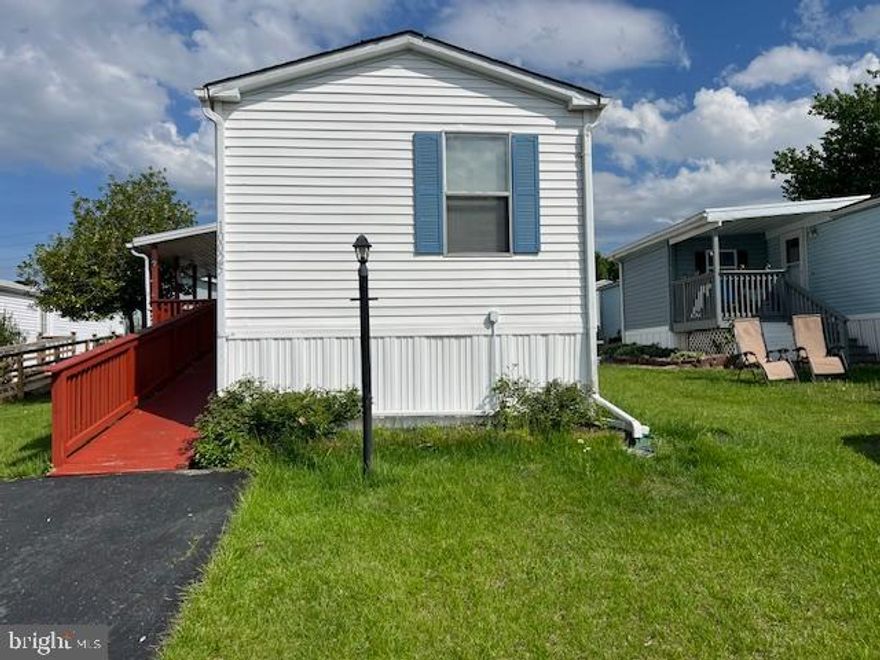 6 MONTHS FREE LOT RENT!!!   GOOD CREDIT NOT REQUIRED AS PRIVATE FINANCING AVAILABLE WITH THE BEST TERMS AT 10% DOWN FOR 30 YRS AT 9%.  RARE HARD TO FIND HOME IN SLEEPY HOLLOW.   HOME HAS 3 BD 2 BA.   INCLUDES HANDICAP RAMP IF NECESSARY WITH LARGE DECK AND AWNING.   LARGE SHED.   ENITRE PARK IS NATURAL GAS.   VERY CONVENIANT TO EVERYTHING AS MINUTES FOR WHITE MARSH MALL.   ROUTE 40, 695, AND 95 ARE LESS THAN 5 MINUTES AWAY.  SLEEPY HOLLOW HAS THE BEST GROUND RENT IN THE AREA AT ONLY $620 PER MONTH.  WHY RENT WHEN YOU CAN OWN AS TOTAL MONTHLY PAYMENT CAN BE AS LOW AS $1,225 PER MONTH.  THIS HOME IS A MUST SEE!!!