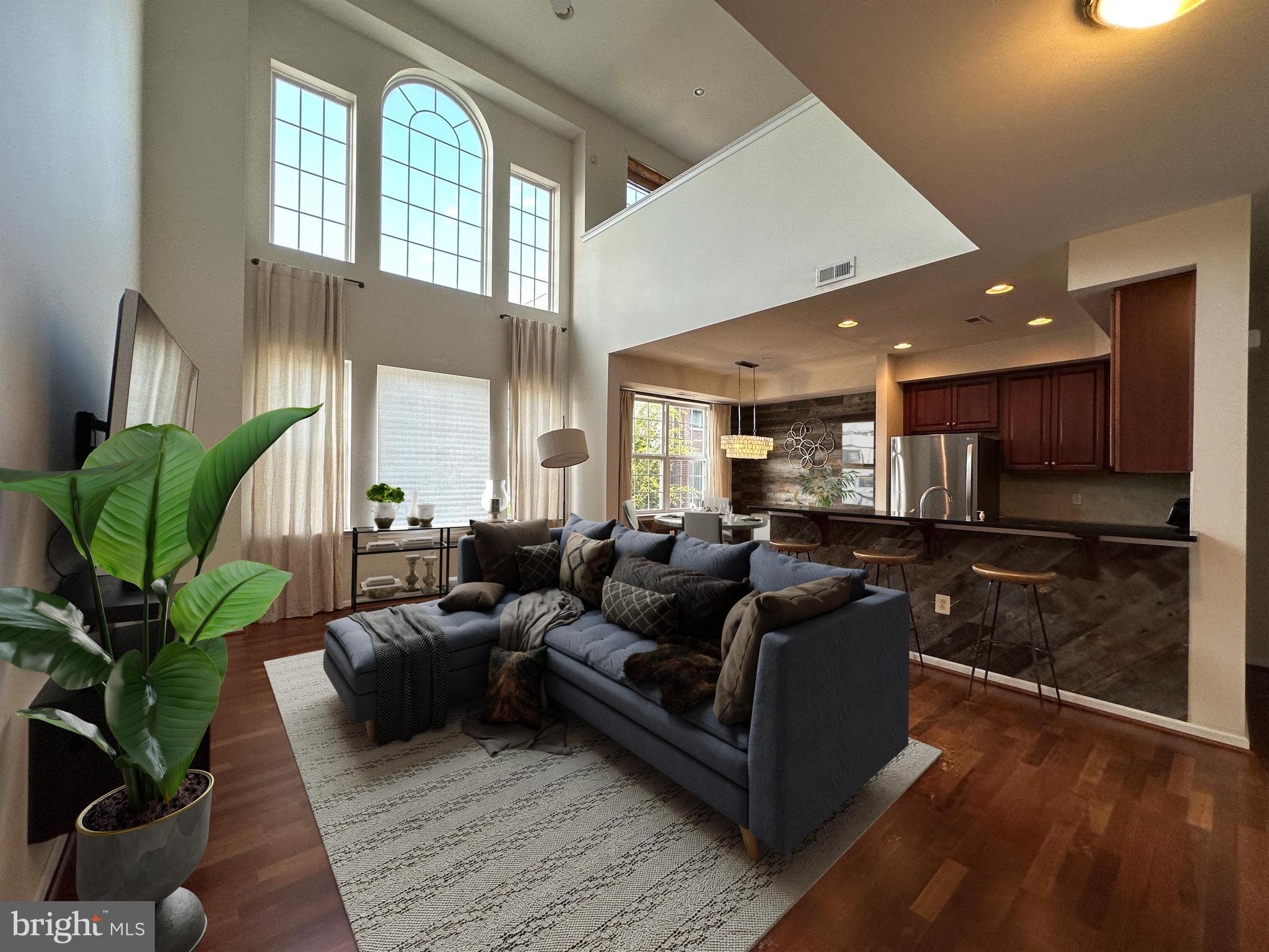 Welcome to a stunning bi-level two-bedroom end unit in the Villas at Packer Park, filled with endless windows and sunlight thanks to the sky-high vaulted ceilings in the living room. The primary bedroom has a walk-in closet, French doors leading to a Juliet balcony, and a master bath with a stall shower, dual sinks, and a full bath. With the most extended driveway in the development, a garage, up to 3 additional car parking spaces, a warm contemporary interior, including hardwood floors in the living space, granite counters, and stainless-steel appliances in the kitchen, and closets galore, this unit is a must-see and makes the perfect home. Schedule your showing today!
** The property does not come furnished.