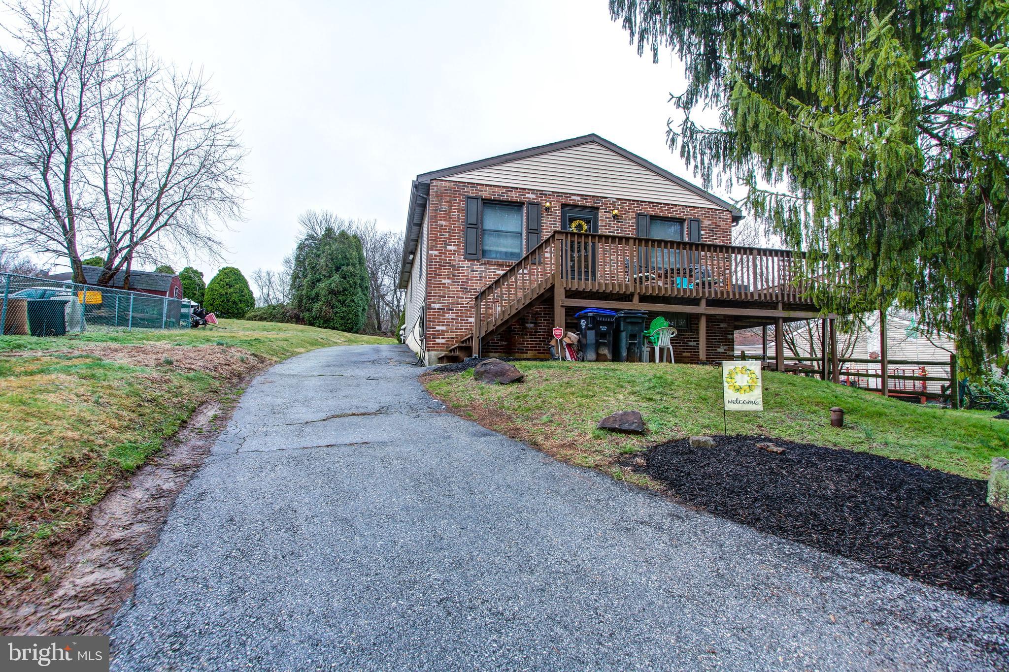 How does a single-family residence with half an acre of land in Delaware County sound?! 814 Bethel Avenue offers this and much, much, more! Approach a long driveway that leads you to the front, wrap-around deck ideal for both morning and evening enjoyment. Just think of the your morning cups of coffee and the evening views of dusk! Enter into the sunlit living room with hardwood floors and an ornate ceiling fan for convenience. Continue through to the open dining area and kitchen, which boasts lovely wooden cabinetry, a matching set of appliances, and a beautiful stone decor backsplash. Make your way through the home to discover three generously sized bedrooms with just the right amount of space for his and hers belongings. The full hall bathroom features a tiled floor, ceramic vanity with cabinets below with overhead medicine space, as well as a tiled shower/tub. Looking to take the entertaining downstairs? Enjoy your own entertainment headquarters and/or create the man cave you ve always dreamed of - utilize this space to however you please! This space is shared with the laundry area as well. Surrounded by green space on all fours, beautiful views from your deck, and centrally located near local shopping centers and highways, add seeing 814 Bethel Avenue to your list today!