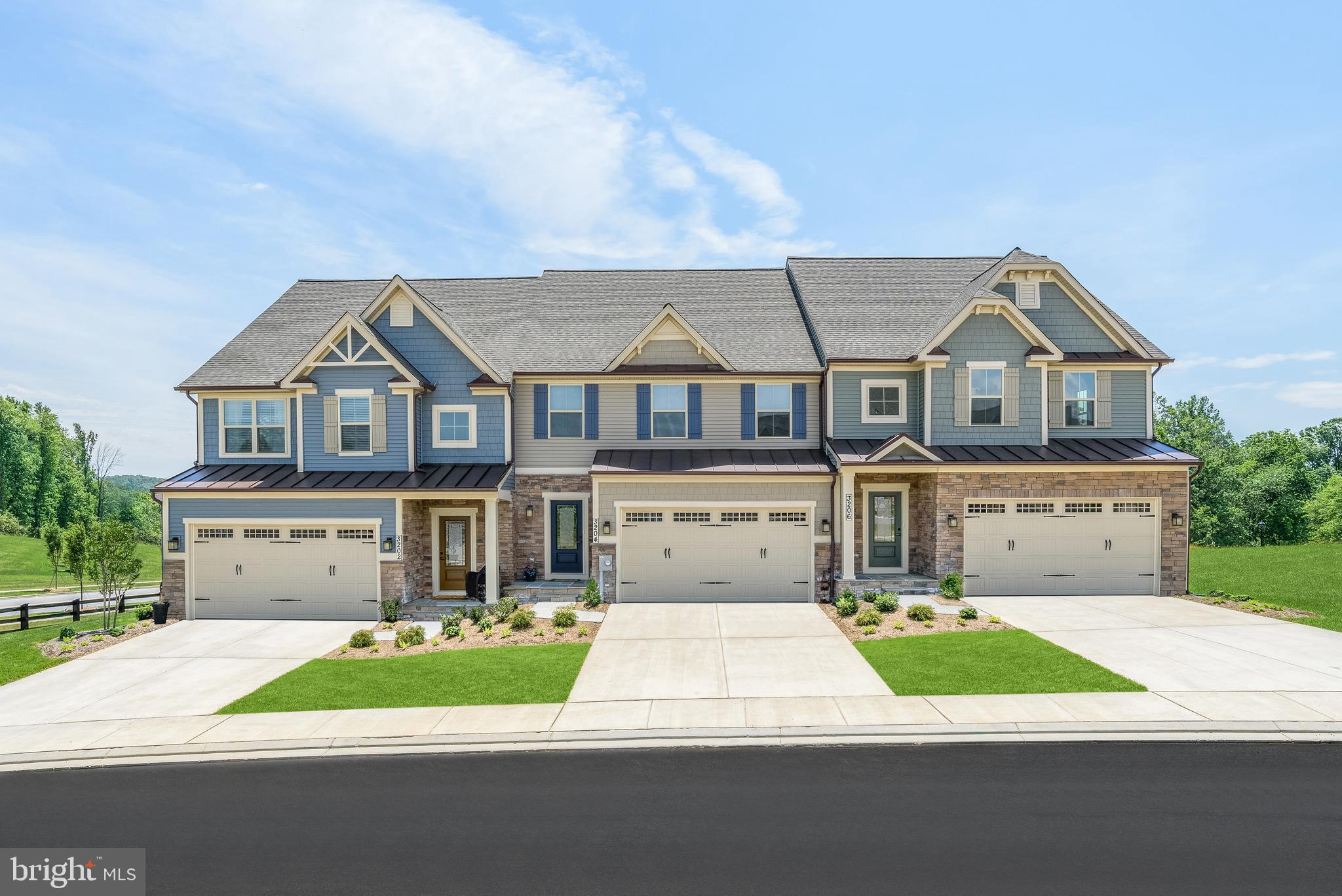 TO BE BUILT- Griffin Hall BSMT. Please note, LIMITED AVAILABILITY on premium homesites! Take advantage of the FINAL Griffin Hall right across from the community amenities! This is a beautiful endhome has a beautiful facade. Price show includes endhome premium, additional windows, and covered porch! First floor living at its finest! Get ready to be impressed with the spaciousness of this villa home! The Griffin Hall will boast 2,293 sq. ft. on the first two floors with an open design and vaulted ceilings in the great room. Having the owner's suite on the first floor coupled with laundry area in the mud room make day to day living easier. Located in southern Frederick County and only minutes from Urbana's vibrant market district, downtown Frederick, and the Montgomery County line. The Woodlands is the brand new, highly sought-after 55+ active adult community in Urbana and will feature tons of amenities to include pool/clubhouse, fitness center, putting green, pickleball courts, trails, and much more! Call today to find out about our current promotions. Photos are representative only.