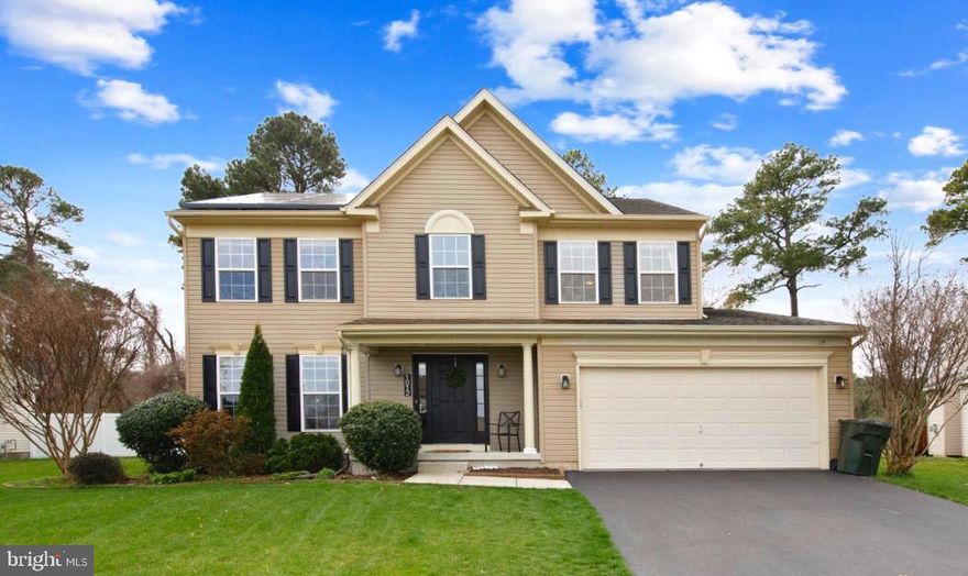 Welcome to perfection. Pristine 4-5 BR, 3.5 BA home in the Harbor Pointe community with new Sun Run Solar System (owned not leased). Owners have done a beautiful makeover in the last 19 months of ownership but have a job relocation now.  PRE-INSPECTED FOR BUYERS - REPORT AVAILABLE!  Seller's prefer closing by mid-May with a rent-back through 2nd half of June.  Built in 2008, this property shows like a new home and is situated on a premium lot which backs up to the Historical Pemberton Park, where you find 262 acres of protected ecosystems and 4.5 miles of walking trails alongside Bell Creek and the Wicomico River. There is a secret trail accessing the park behind the home.  The first owners chose this special lot to build upon and carefully selected many upgrades and expansions offered by the builder such as adding 2' to the width and 2' to the the depth.  The first floor welcomes you with a 2 story open foyer and new Luxury Vinyl Flooring throughout first floor.  A formal living room and dining room with open flow are just off of the foyer and feature chair rail, custom woodworking, and a beautiful bay window.  The heart of the home is the kitchen and great room area, where you find a spacious kitchen with granite counters, spotless stainless appliances, an island, and a sunny space for casual dining.  The stone accented gas fireplace and hearth area are a focal point of the adjacent great room where you will be sure to spend many happy hours.  Sunlight fills this whole area and the dimmable recessed lighting keeps the nights bright and charming.  Sliding door access to the rear deck and private back yard is just off of the breakfast area.  A first floor laundry room with modern barn door, includes newer washer and dryer, storage cabinets, and access to the garage.  A half bathroom off the foyer services the 1st floor.   Upstairs is the spacious master bedroom with two closets, one of which is a cheerful walk-in with a window. The beautiful master bathroom is in mint condition with double sinks, soaking tub and separate shower with gleaming white tile and new glass enclosure.  The 2nd and 3rd bedrooms offer spacious sizing, beautiful natural light and ceiling fans. The 4th bedroom is slightly smaller and used as an office currently.  The full hallway bathroom was recently upgraded with all new fixtures and lighting, gorgeous new subway tile flooring and tub/shower surround.   A rare feature in our area and a true highlight to this home, is the fully finished walk-out basement complete with laminate flooring, a large L shaped family room, several closets, a large 5th bedroom with closet (ground level window not egress sized), a full bathroom with tile floors, and utility closets for access to home systems and the 2 sump pumps w/ backup battery Basement is also accessible from inside.   Smoke alarms were updated 2 years ago, and this home has a high tech security system with cameras that is zero cost to the owner.  It is self monitored through wi-fi mobile access and requires no additional monitoring costs.  The 2 car garage is clean and has storage shelving, and door lift.   A full irrigation system keeps the yard green and plush, inviting you to enjoy the outdoors! The private back yard and deck are perfect for escaping the hustle bustle and you can walk to Pemberton Park!  Energy efficient Natural Gas is another incredible feature providing low cost heat, hot water and cozy fireplace. Public water and sewer eliminate septic and water quality worries. HOA = $183 per year.  Above grade approx. 2283 sq ft with 4 BR, 2.5 BA; Finished basement approx 953 sq ft with 1 BR (non egress), 1 BA and outside access. Solar system sold seperately and not included in price of home.  Warranties transfer to new owner. New Stove and Dryer.  Buyer to confirm taxes, schools, sq footage to their satisfaction. Sq. ftg  was derived from previous appraisal and house plans.See documents attached for trail guides.