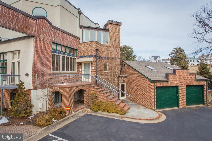 Evolving from a former factory, a luxurious, one of a kind town home offers downtown, maintenance free living .  3 levels of  open space provide ideal entertaining and private areas. A top level master suite displays an upscale bath & a spacious sitting room overlooking a historic landmark. Vaulted ceilings, skylights, a sun room, elevator & 2 car garage complete this exceptional offering.