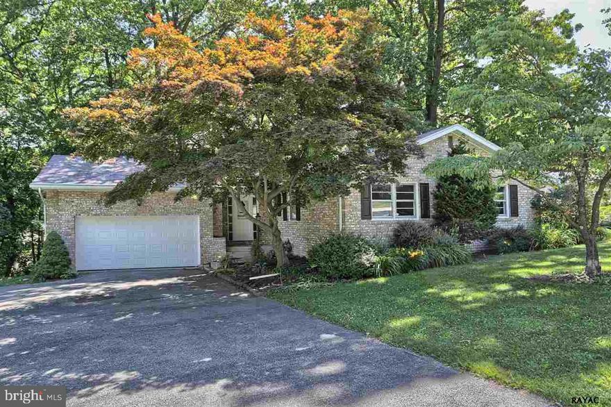 Stunning luxury rancher w/brand new upgrades! Gleaming wood floors throughout. Modern mocha cabinetry w/Carrera Marble tops. Truly open flowing floor plan. Luxury master bath w/modern touches! Huge finished basement w/8ft high ceilings & a bar! Park-like corner lot w/easy access to all! One of a kind find!