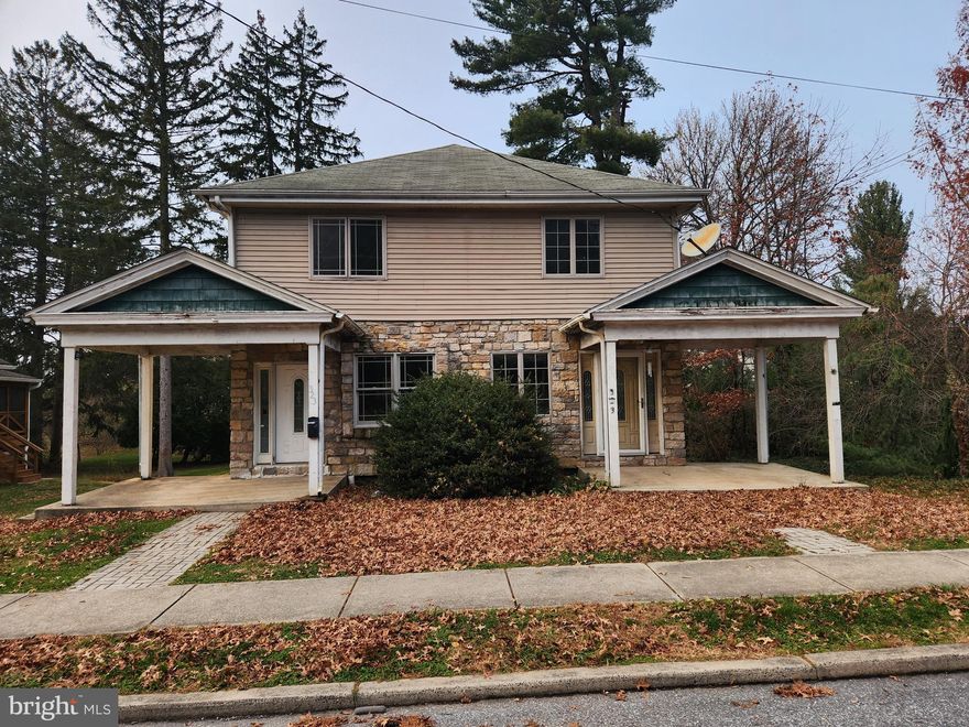 This property will be offered at Public Auction on Saturday, January 10, 2026 @ 10am.  The listing price is the opening bid only and in no way reflects the final sale price.  10% down due at auction, 2% transfer tax to be paid by the purchaser, real estate taxes prorated. This former duplex investment property in Elizabethtown Borough is ready for its next owner! The first floor is currently arranged as two living areas connected by a single interior doorway, with each side offering its own front entrance. Both sides include an open living and dining area and a kitchen; one side also features a mudroom, while the other includes a full bathroom and laundry area. The second floor—accessible by separate staircases from each side—offers six bedrooms, two full bathrooms, and access to a walk-up attic. Additional amenities include an outdoor deck and a storage shed. The property is conveniently located near the local school district and college, community parks, and Routes 283 and 230. Don’t miss this great opportunity to start or grow your investment portfolio!
