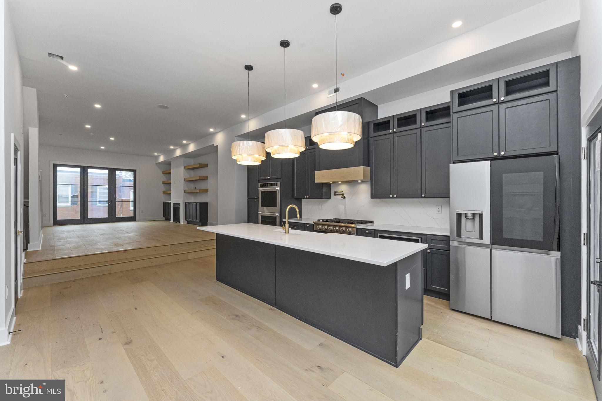 Stunning New Construction Home with Private Parking (2 spots) in the Heart of Manayunk, Philadelphia
Welcome to this exceptional 3,500 sq. ft. single-family home, perfectly situated in the highly desirable Manayunk neighborhood. Combining luxury, modern design, and unbeatable convenience, this home offers both a spectacular space for entertaining and a serene retreat for relaxation.
Inside, you'll find 5 spacious bedrooms, 3 full bathrooms, and 2 powder rooms, making it ideal for hosting guests. The primary suite is a true sanctuary, featuring a spa-like bathroom with double shower heads and a soaking tub for ultimate relaxation.
The chef's kitchen is a culinary enthusiast’s dream, equipped with high-end finishes, including a double oven and a gas range. The open-concept living area, with its cozy gas fireplace and stunning 10-inch hardwood floors throughout, adds warmth and sophistication to the home.
For the tech-savvy homeowner, this property includes a Ring doorbell system and a surround sound setup, offering modern convenience at every turn. Step outside to the private roof deck, complete with sleek glass railings, offering breathtaking views and the ideal setting for relaxation or entertaining.
This home is approved for a full 10-year tax abatement, providing incredible savings. Plus, enjoy walking distance to the vibrant shops, restaurants, and amenities that make Manayunk so desirable.
Don't miss out on the opportunity to make this luxurious home yours!