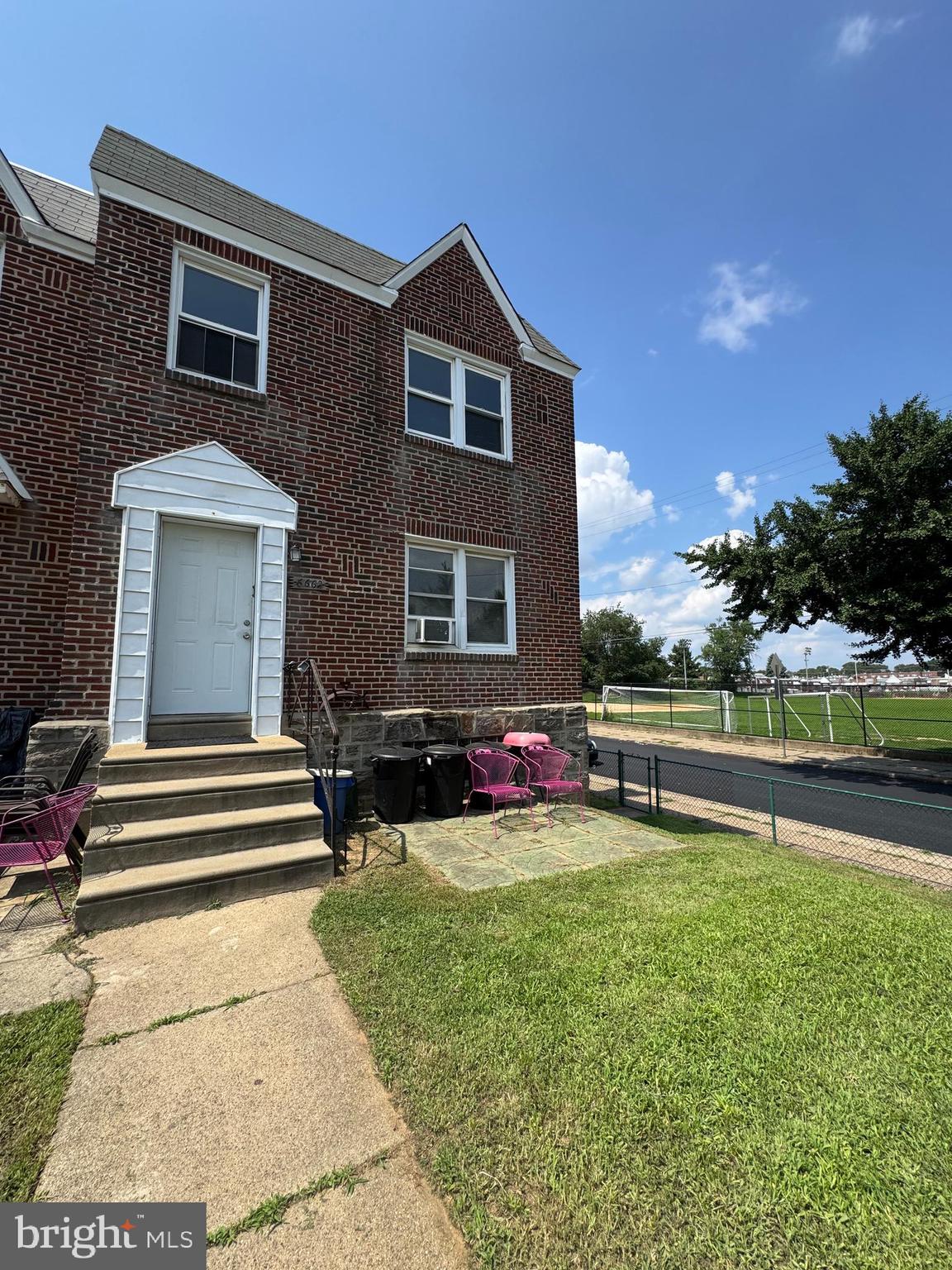 Don’t miss this end-unit duplex featuring a tenant-occupied 1-bedroom unit on the first floor, providing immediate rental income. The second-floor unit offers 2 spacious bedrooms, 1 full bath, newer laminate flooring, fresh paint, an eat-in kitchen, and a large living room. Additional highlights include an above-ground basement entrance, shared laundry units with storage space, an oversized 2-car garage, rear driveway parking, and a gated side yard — a rare find in the city! Located on a quiet street directly across from Vogt Playground & Rec Center, this property offers both convenience and charm. Perfect for investors or live-in owners!