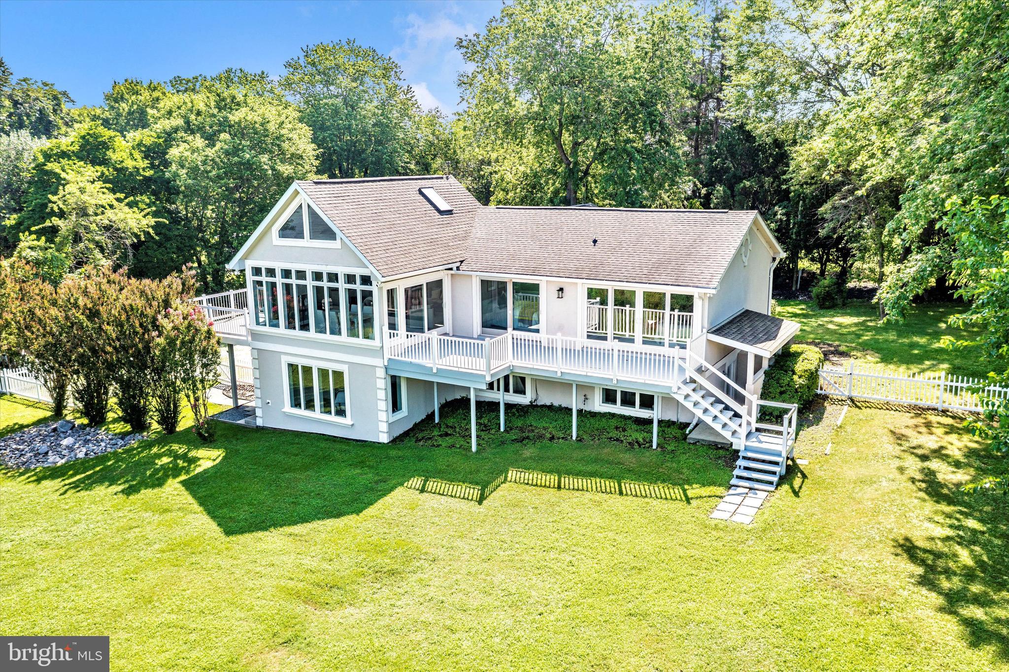 Stunning 4-Bed, 3-Bath Waterfront Home with Breathtaking Views for miles!
Welcome to your dream home! This beautifully designed 4-bedroom, 3-bathroom property offers unparalleled water views from nearly every room. Step inside to discover an open-concept living space with large windows that flood the home with natural light and provide stunning vistas of the water. The chef’s kitchen is equipped with stainless steel appliances, a spacious island, and plenty of storage for all your culinary needs.
The primary suite is a true retreat, featuring high ceilings and access to the back deck to take in the views. Each of the additional bedrooms offers generous space and beautiful finishes, perfect for family or guests. With multiple living and dining areas, including a cozy family room with a fireplace, this home is ideal for both entertaining and relaxation. You can see the water from almost every room in this home! Downstairs offers space for a game room or home office or whatever your family needs. New flooring and freshly painted, updated bathrooms are just a few of the touches this owner has added to this amazing estate.
Outside, enjoy the expansive deck or patio area that overlooks the water, making it the perfect spot for outdoor dining or simply soaking in the scenery. Fantastic Rockfish fishing and Crabbing right out back! Whether you’re looking for a peaceful getaway or a place to entertain, this home has it all. Green house built in out front is a gardeners dream or convert this space to additional living! 2 docks on the water to house the boat(s) of your dreams! Don’t miss your chance to own this stunning property with water views for days!
Call today to schedule your private showing!