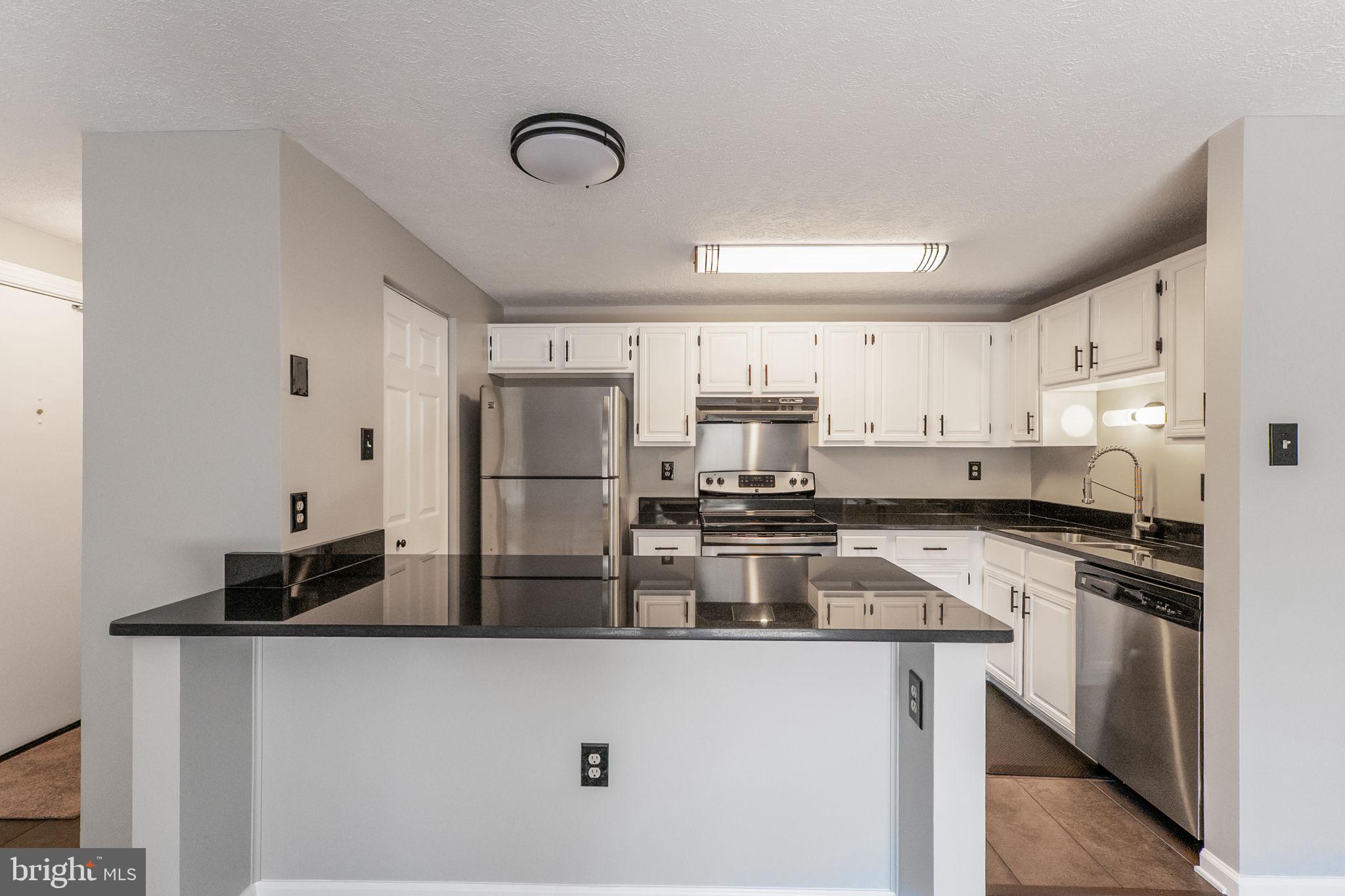 KNOLLS AT NORTH LAKE CONDOMINIUM - Residential