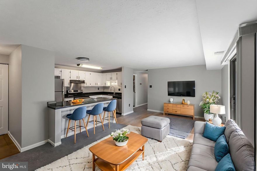 Discover the perfect blend of comfort and convenience in this 2-bedroom, 2-bath, completely renovated condo.  Offering 888 square feet of living space, this home features a traditional floor plan designed for both relaxation and entertaining. Step inside to find a bright and inviting living room with direct access to a private balcony.  The primary bedroom is a true retreat, boasting abundant natural light, new windows, a walk-in closet, and an ensuite bath. The second bedroom is generously sized with large new windows.  Additional highlights include an in-unit laundry room with a washer and dryer.   A home this nice, at this price, wont last long!  Schedule your showing today!