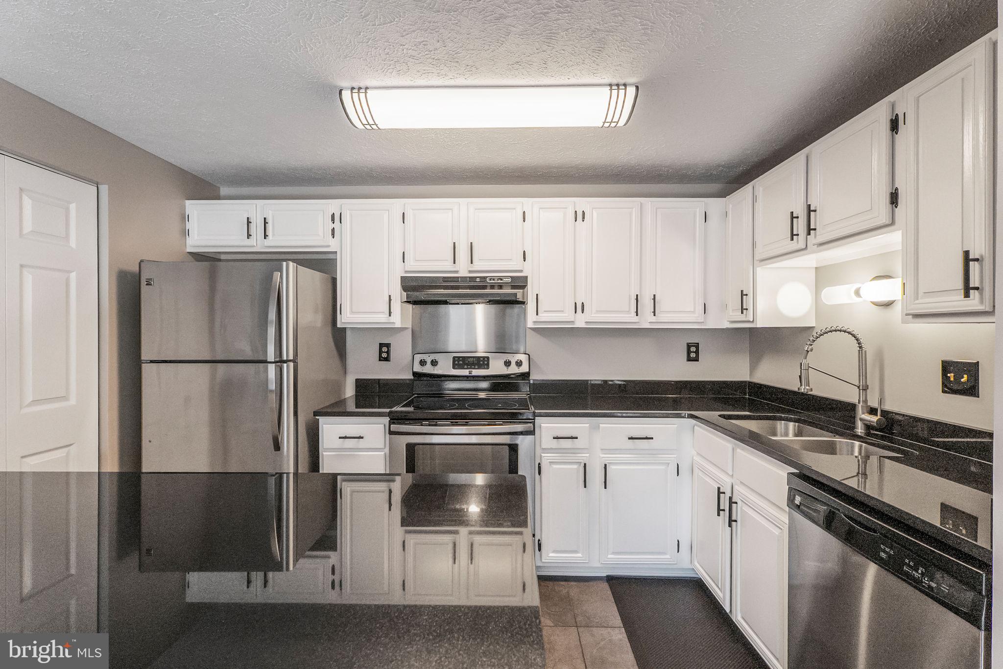 KNOLLS AT NORTH LAKE CONDOMINIUM - Residential