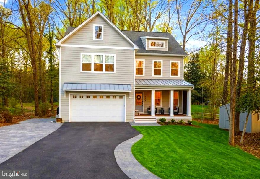 The crown jewel of Arden on the Severn.

Rarely available, this stunning Arden on the Severn Whitehall Building & Company 2024 new build on coveted Waterview Drive offers what many consider the best street, in the best neighborhood, on the most desirable side of the street—the water side.

Built in 2024 by Whitehall Builders, this custom home showcases exceptional craftsmanship, thoughtful design, and a level of upgrades that elevate it far beyond typical new construction. Recently appraised over $100,000 above the current list price, this is a rare opportunity to step into instant equity while enjoying refined coastal living.

The home features a bright, open-concept layout filled with natural light and seasonal views of the Severn River. The main living spaces flow seamlessly, designed for both everyday comfort and effortless entertaining, with custom oak trim work, tray ceilings, and decorative ceiling beams that add subtle architectural character, along with upgraded artistic lighting fixtures and a warm, modern aesthetic throughout.

The kitchen anchors the home with sleek surfaces and abundant storage, opening into expansive living and dining areas that invite connection and ease.

Upstairs, each generously sized bedroom offers walk-in closets, while the primary suite provides a peaceful retreat. A standout feature is the front porch with powered retractable screens, creating a versatile indoor-outdoor living space to enjoy year-round.

The newly finished lower level adds tremendous value and flexibility, featuring:
• A full bedroom and bathroom
• A separate private entrance
• Wide open living space ideal for recreation, guests, or multi-generational living
• Dedicated storage areas

Comfort and efficiency are enhanced with separate HVAC systems for the upper and lower levels, allowing for optimal climate control throughout the home.

Set on an expansive lot nearing half an acre, the property offers both privacy and room to enjoy the outdoors. Mature trees surround the home, complemented by new sod in the front yard and fresh interior paint throughout. Storage is abundant, with a large interior storage room, additional under-stair space, and a backyard shed.

The oversized driveway provides ample parking for multiple vehicles and is large enough to accommodate a boat or recreational vehicle with ease, in addition to the attached two-car garage. An upgraded electrical system enhances functionality, making the garage EV-charging capable and well-suited to power a boat, RV, electric vehicle, or other high-demand equipment.

Located within a walkable, close-knit waterfront community, residents enjoy access to multiple private beaches, boat ramps, and shoreline amenities along the Severn River—bringing the Chesapeake lifestyle right to your doorstep.

Convenient to Annapolis, Washington, D.C., Baltimore, and Northern Virginia, this home offers the perfect blend of luxury, space, and accessibility.

A rare chance to own a slice of waterfront paradise—without the waterfront price tag.