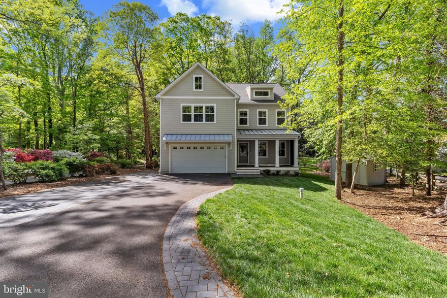 The crown jewel of Arden on the Severn. Rarely available, this exceptional 2024 custom build by Whitehall Building & Company on coveted Waterview Drive offers what many consider the best street, in the best neighborhood, on the most desirable side of the street the water side.

Now offered at $948,000 after a significant price improvement, this home was recently appraised at $1,175,000 just two months ago, presenting a rare opportunity to step into substantial instant equity while enjoying refined coastal living in one of the area's most sought-after waterfront communities.

This home showcases thoughtful design, elegant finishes, and a warm modern aesthetic throughout. Natural light pours into the open-concept layout, complemented by seasonal Severn River views, custom oak trim work, tray ceilings, decorative ceiling beams, and upgraded custom lighting fixtures.

Designed for both comfortable everyday living and effortless entertaining, the kitchen anchors the home with sleek finishes, abundant storage, and seamless flow into living and dining spaces.

Upstairs you will find generously sized bedrooms with walk-in closets and ample storage, while the spacious primary suite provides a peaceful retreat. One of the home’s standout features is the screened front porch with powered retractable screens, creating a versatile indoor-outdoor living space that can be enjoyed year-round.

The finished lower level adds tremendous flexibility and value with a full bedroom and bathroom, private entrance, expansive open living area ideal for guests or recreation, and dedicated storage space — perfectly suited for multigenerational living, extended guests, or additional entertaining space.

Separate HVAC systems for the upper and lower levels provide enhanced comfort and energy efficiency throughout the home.

Situated on an expansive lot nearing half an acre, the property offers privacy, mature trees, fresh interior paint, and newly installed front-yard sod. Storage is abundant with a large interior storage room, additional under-stair storage, and a backyard shed.

The oversized driveway easily accommodates multiple vehicles, boats, RVs, or recreational equipment in addition to the attached two-car garage. An upgraded electrical system further enhances functionality, making the garage EV-charging capable and well-equipped for high-demand equipment and watercraft needs.

Residents of this walkable waterfront community enjoy access to multiple private beaches, boat ramps, and shoreline amenities along the Severn River, bringing the Chesapeake lifestyle directly to your doorstep.

Conveniently located near Annapolis, Washington, Baltimore, and Northern Virginia, this home offers a rare combination of luxury, community, space, and accessibility.

A unique opportunity to own a slice of waterfront living — without the waterfront price tag.