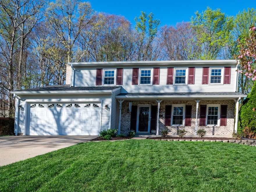 Escape from the outside world into this delightful house.  From the welcoming front porch, a classic spot to enjoy the sunset and neighborhood activities, to the screened porch overlooking the wooded rear yard, this house provides numerous places to relax and recharge. 
The family room and adjoining screen porch form a delightful hub of activity.  Whether streaming a favorite movie or watching the World Cup or other sports on the big screen, with the fireplace glowing, you know this is perfect: where relaxation and unwinding come easily.
The updated adjoining breakfast/kitchen becomes the natural center of activity whether to replenish snacks, whip up a quick dinner or something more ambitious:  ideal for whatever your lifestyle: morning coffee, casual meals, or grilling on the deck.  Kebobs, burgers or steak, your choice without having to miss the action.
When it is time to host, the living and dining rooms are designed for gatherings—holidays filled with laughter, celebrations with family and friends, evenings creating pleasant memories.
Four comfortable bedrooms provide pleasant  private spaces on the upper level. The primary suite offers a dressing area, an updated bath designed for everyday comfort as well as a walk-in closet.  Updated hall bath with tub.
The finished lower level adds an excellent layer of flexibility: the spacious recreation room is an ideal spot for gatherings or game nights when winter closes down use of the screened porch. Note updated third full bath provides the possibility of sleep overs and other family activities. Plus the configuration of this rec room allows multiple usages simultaneously: media, board or video games, exercise,+++
And while the setting feels peaceful and tucked away, the location keeps you effortlessly connected. Just a few minutes away: I95 and everyday conveniences — Starbucks, restaurants, shopping, marinas and county parks — are all close at hand.