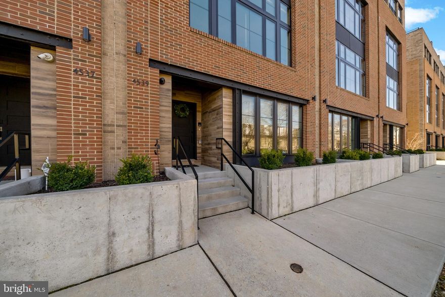 It's not just the unique waterside living that sets this stunning townhome a part. Experience high end luxury in the center of the Schuylkill River and Manayunk Canal. Welcome to The Locks at Venice Island! This high quality, 23 ft wide, newly constructed townhome is sun drenched, with modern and sophisticated finishes throughout.The ground floor offers a multifunctional space perfect for a bright study or game room. The second level is well equipped for the inspired entertainer! With a crisp and clean design, the kitchen is outfitted with Thermador stainless steel appliances, an island with five person counter seating, and pantry closet. There’s a bar area with wooden shelving and additional cabinetry that creates a breakfast or sitting area to enjoy the river views. A powder room and open concept dining and living room complete this divine space. The third level features an ensuite guest room, two additional bedrooms, a full bathroom with dual vanity, and laundry room. The primary suite is an owner’s oasis with motorized window treatments, custom shelving and built-ins, a private balcony, massive walk-in closet, and wet bar area. The exceptional primary bath has a walk-in marble shower and large soaking tub. An additional room that could be utilized as a nursery, study, or home gym completes this deluxe retreat. Enjoy the comforts of smart home features, two car garage parking, and an elevator servicing the ground level to the rooftop terrace, which provides some of the most picturesque views. Conveniently located with easy access to center city, The Locks is only a short stroll to the eclectic charm of Main Street and downtown Manayunk where you'll find endless shopping, dining and entertainment options. Don’t miss out on this truly stunning home!