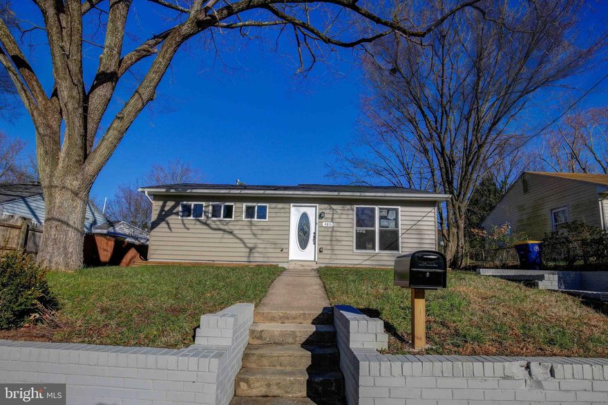 Beautifully Remodel Home Minutes from DC, Come home to this beautiful renovation. Fabulous open layout with all the right spaces and storage throughout. 4 bedrooms with 2 full bathrooms, Cook for 2 or 20 in the new gourmet kitchen with custom cabinets, granite, and SS appliances. Then cozy up and relax by the fireplace or in the luxurious master suite. Large bedrooms, lots of window, new furnace, hot water heater, driveway, hardwood flooring, the list goes on and on. Close to highways, public transportation and daily shopping. Comfort and style, savings and convenience, all in one.