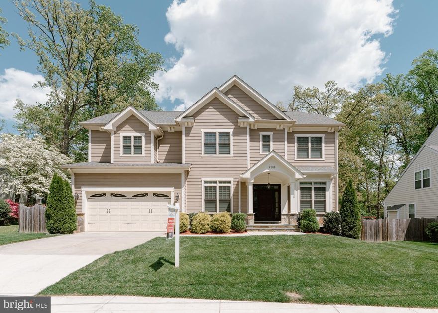 Perfectly situated in the highly sought-after Vienna Woods neighborhood, this stunning 5-bedroom, 7-bathroom home is a true gem, boasting 5,183 square feet of total living space (with over 3,990 square feet above ground). As you step through the front door, you are greeted by a luxurious foyer adorned with high-quality marble flooring, setting the tone for the elegance and sophistication that lies within. The foyer seamlessly flows into the family room, which is connected by a grand curved staircase leading to the second floor, showcasing high-quality and innovative design throughout. The expansive family room features a modern tray ceiling and a gas fireplace, creating a cozy atmosphere perfect for family gatherings. The room opens up to a Trex deck, providing the ideal space for outdoor entertaining. The gourmet kitchen is a chef's dream, equipped with top-of-the-line appliances, elegant French Country Kitchen cabinetry, and a generous center island. A large pantry room is conveniently located off the kitchen and connects to the two-car garage. The luxurious master bedroom suite is a sanctuary, boasting two oversized custom walk-in closets and a huge master bathroom with a shower and freestanding tub. Each of the additional bedrooms has its own private bathroom, providing ample space and privacy for family members and guests. The upper level also features a laundry room for added convenience. The finished lower level offers even more living space, with a recreation room and wet bar, as well as a gym, bedroom, and full bathroom. Step outside to the private fenced backyard, perfect for enjoying the outdoors in peace and privacy. Membership to the Vienna Woods Swim and Tennis Club is available, offering additional recreational opportunities. Located in the coveted Madison school pyramid, this home is conveniently located close to the Vienna Metro and bus stop, as well as downtown Vienna with its shops, restaurants, and parks. Easy access to I-66, Rt. 123, I-495, and Rt. 50 makes commuting a breeze. Don't miss this opportunity to own a truly exceptional home in one of Vienna's most desirable neighborhoods!