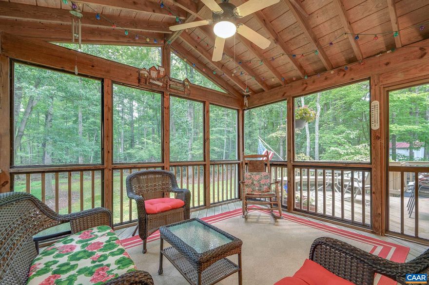 Convenience meets privacy in this 4-bedroom Keswick home on 2+ acres in wine country just a few miles to Downtown, Pantops Shopping, Hospitals, Monticello & James Monroe's Highland, and I-64. Enjoy the comfortable neighborhood feel of Auburn Hills from your own wooded, park-like setting with incredible outdoor living spaces including large deck, screened porch, two patios, and firepit area. This split-level feels like home from the moment you step inside--upstairs you?ll find a spacious living room open to dining and the vaulted screened rear porch, updated kitchen, primary suite with renovated en suite bath, two spare bedrooms and full hall bath. The terrace level includes a den with wood-burning fireplace, rec room, expansive in-law suite with attached full bath w/ jacuzzi, full laundry room, and storage room. Recent improvements include: renovated kitchen and primary bath, newer bamboo & LVP flooring, fresh paint, new modern fixtures, & fresh landscaping. Plus, roof, energy efficient windows, hot water heater, plumbing and deck are all new within 10 years.,Granite Counter,Wood Cabinets,Fireplace in Basement,Fireplace in Family Room