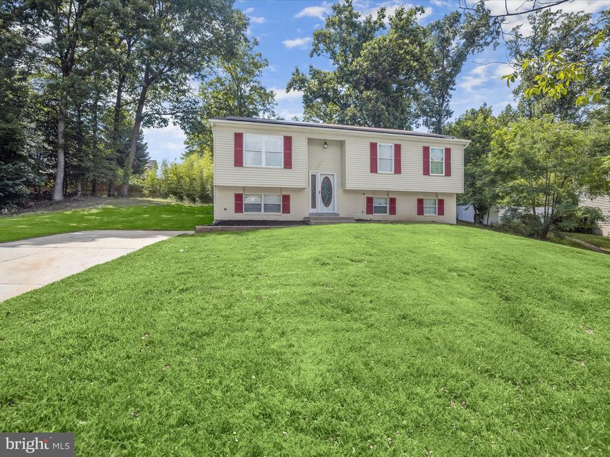 Lock Box has been fixed. please go and show. Welcome to this beautifully renovated split foyer home in the desirable Fort Washington area of Maryland! Step inside to find a light-filled main level featuring a neutral color palette and warm-toned hardwood floors that flow seamlessly into the dining area, complete with access to a spacious deck, perfect for indoor/outdoor entertaining. The gourmet eat-in kitchen is a chef’s dream, showcasing contemporary patterned subway tile, stainless steel appliances, 42” soft-close cabinetry, and sleek granite countertops. The home also features energy-efficient solar panels, offering long-term savings and environmental benefits.  The primary bedroom suite features a double closet and a stylish en-suite bath, complete with marble-inspired flooring and a walk-in shower. Two additional bedrooms and a full hall bath complete the main level. The fully finished lower level expands your living space with a generous family room with plush carpeting and walk-out access to the side yard, a fourth bedroom, a private office with storage, and an additional full bath, perfect for guests or multi-generational living. Conveniently located near major commuter routes, including MD-210, I-95, and I-495, offering easy access to Washington, D.C., and beyond.